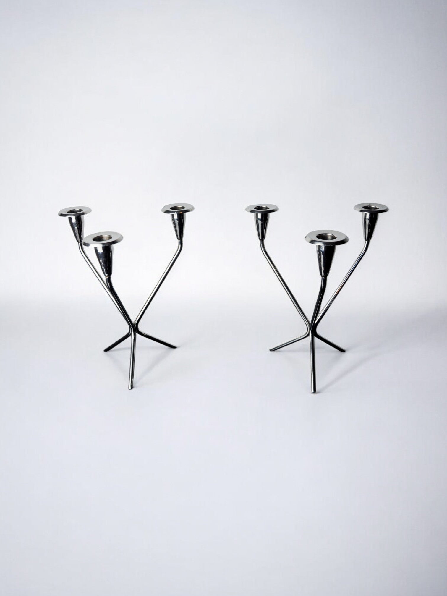 Pair of art deco stainless steel 3-flame candlesticks, Spain, 1970