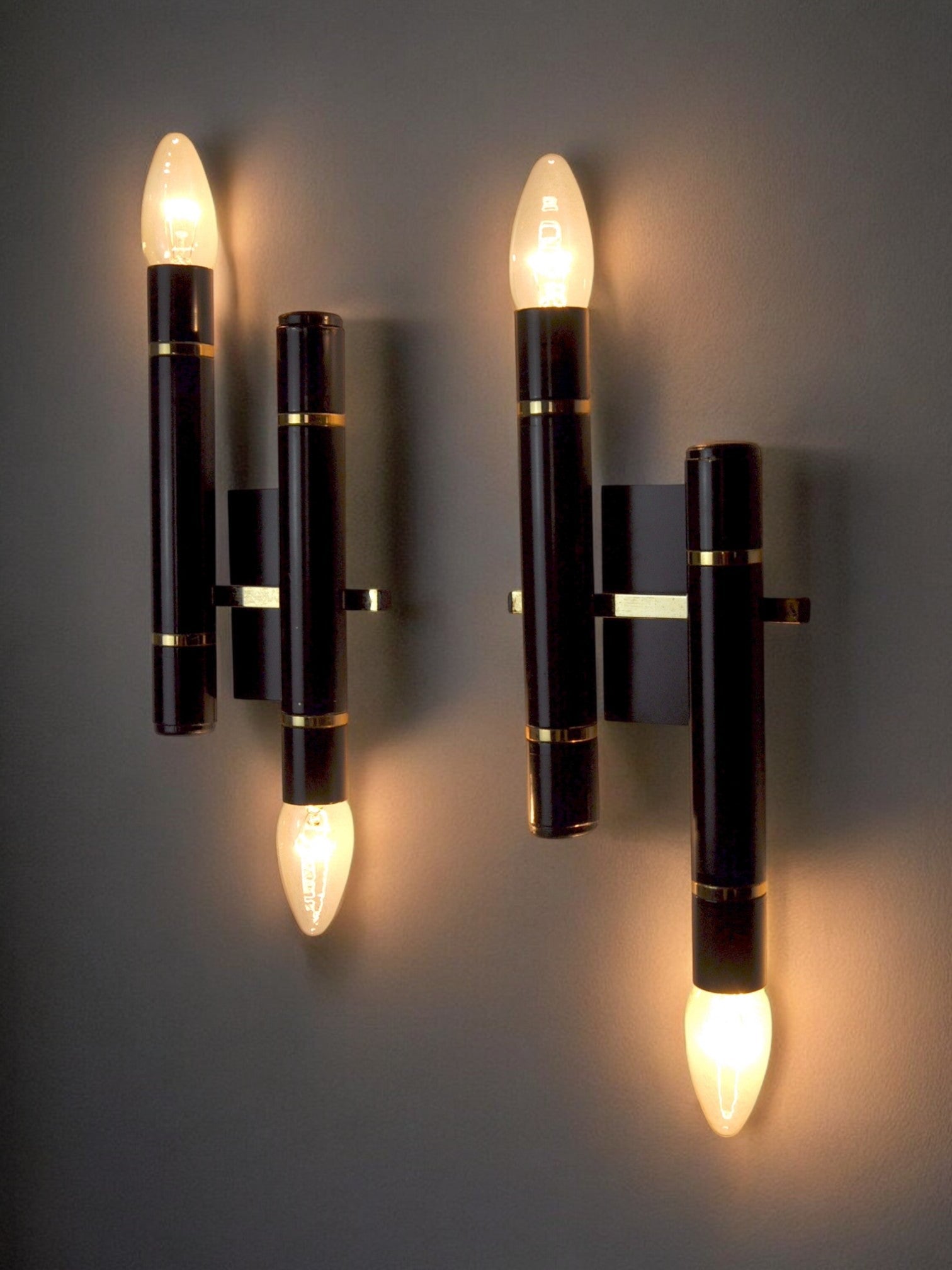 Pair of tubular sconces from the sciolari house, italy, 1970s