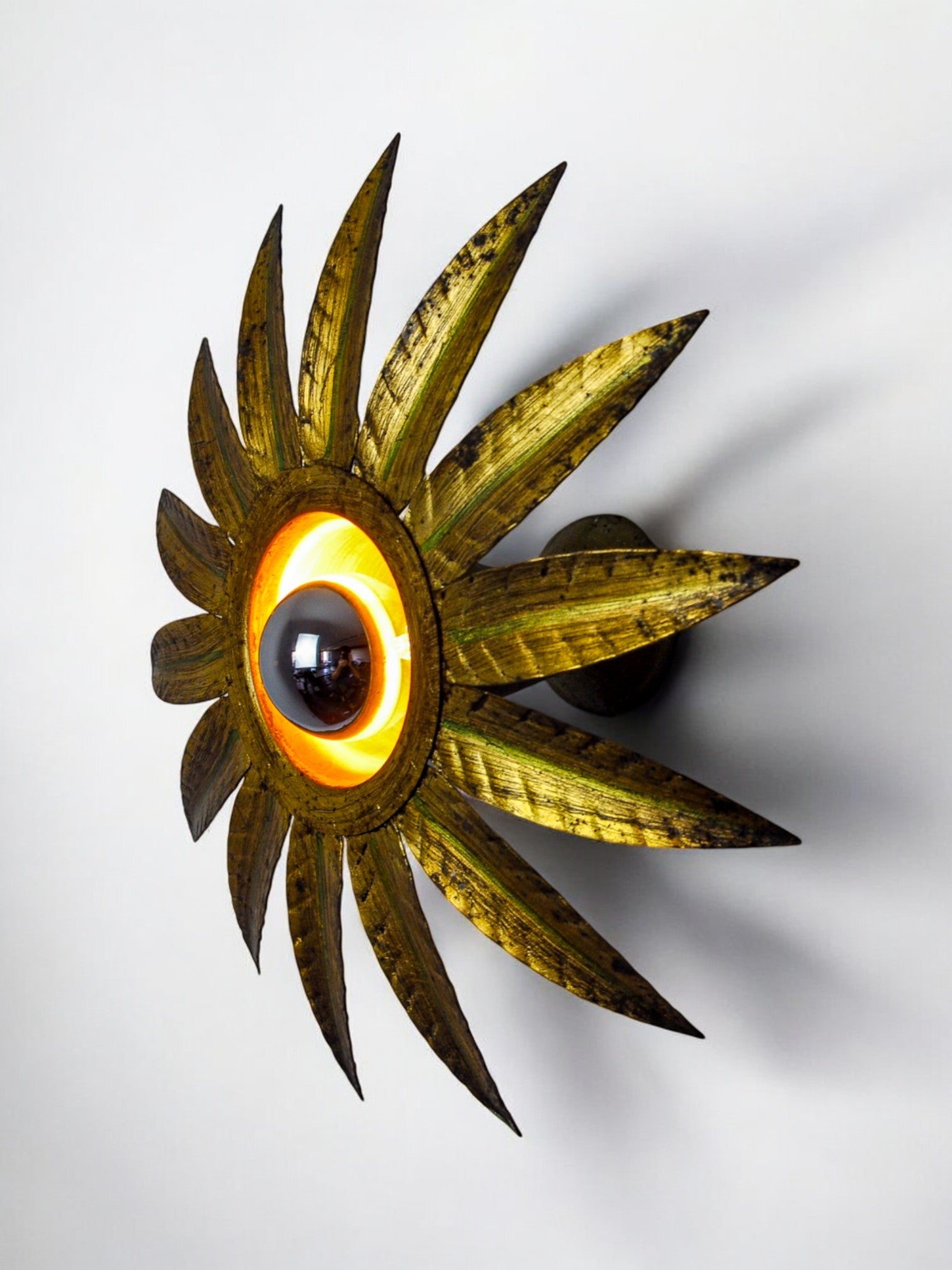 Sun wall lamp by ferro arte, metal and gold leaf, Spain, 1960
