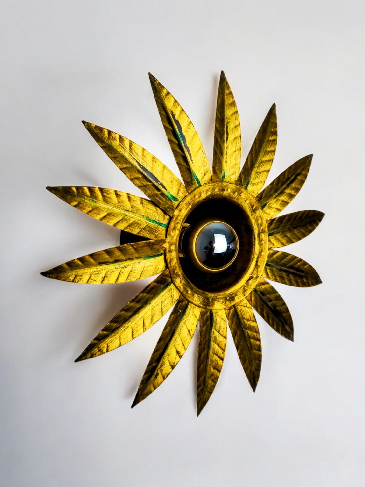Brutalist sun wall lamp in gilded metal with gold leaf, Italy, 1970