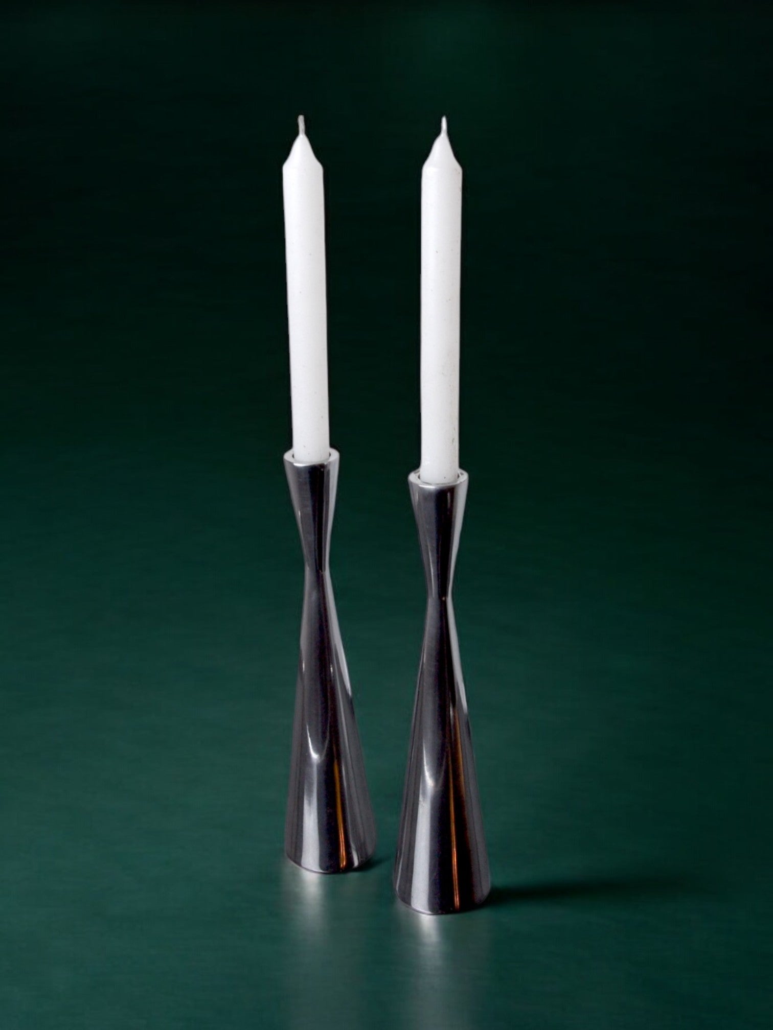 Pair of Scandinavian diabolo candlesticks, aluminium, suede, 1970