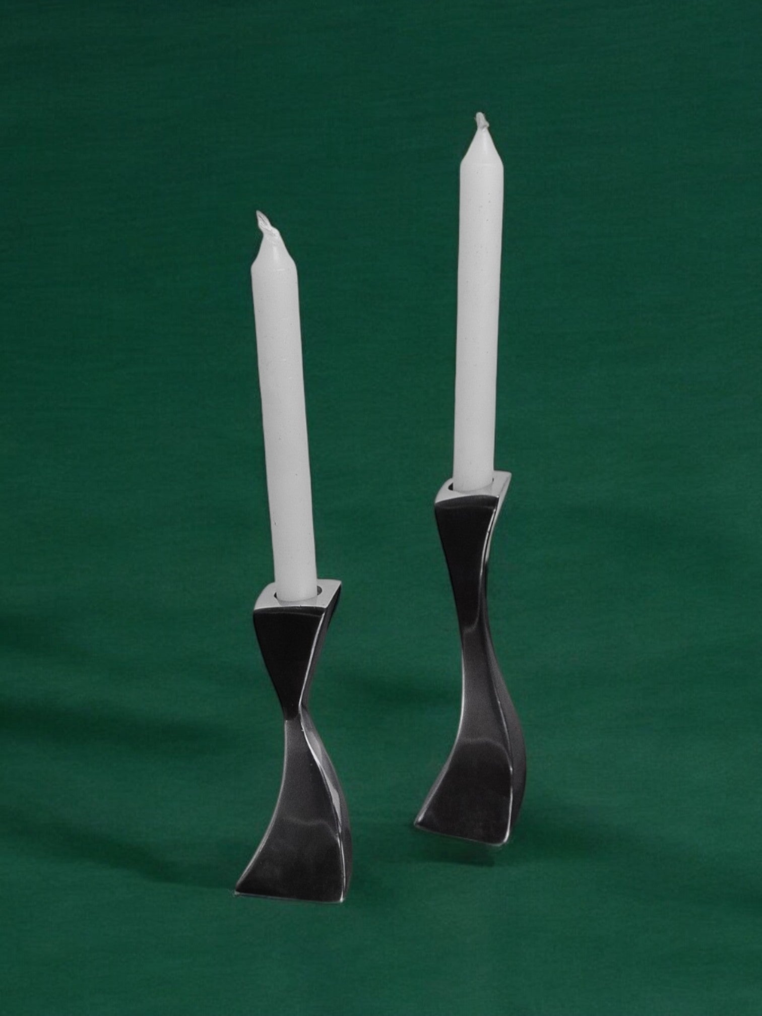 Pair of Swan candlesticks by Matthew Hilton, England, 1980
