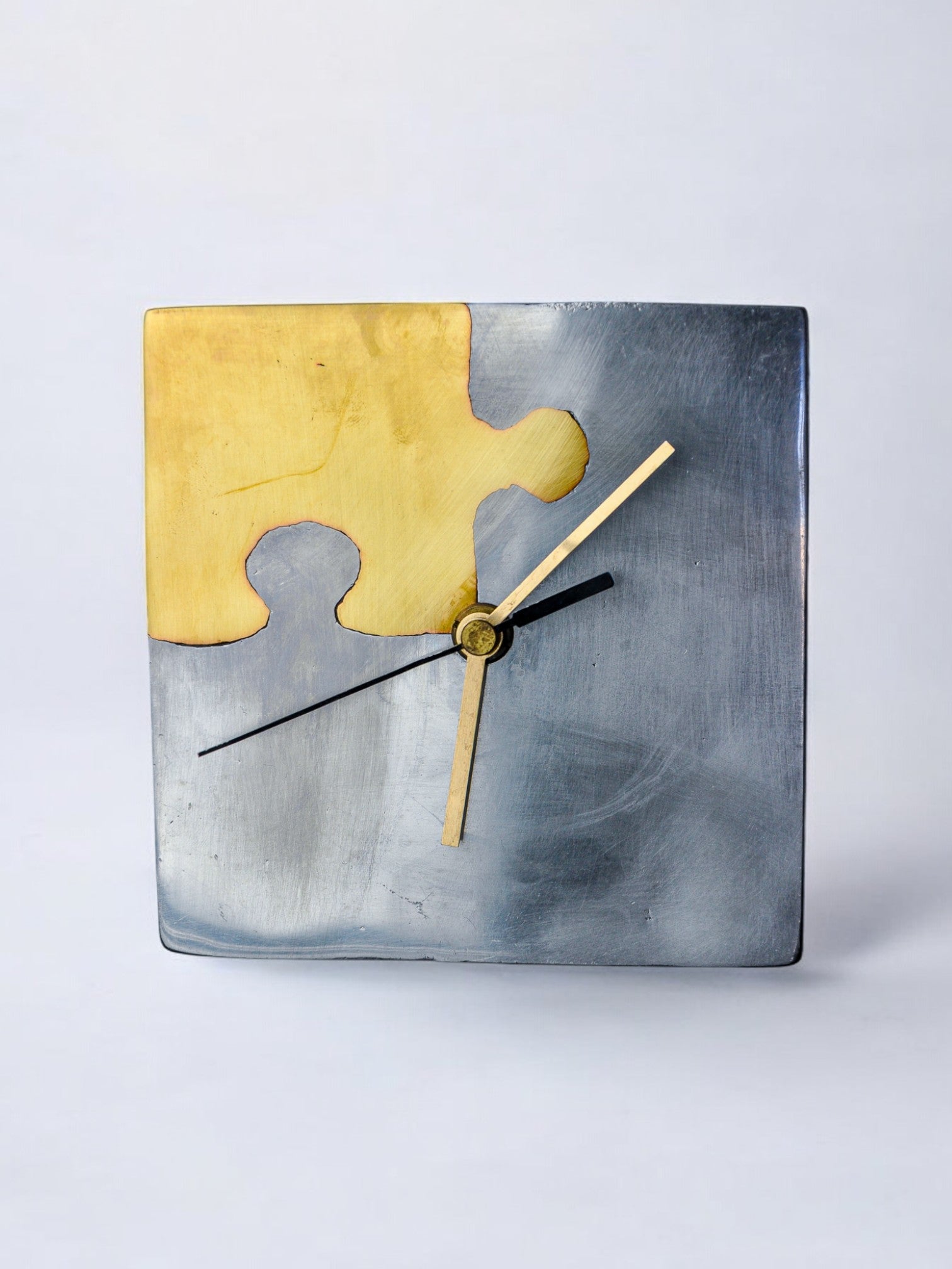 Brutalist clock "Puzzle" by Art3, brass and aluminum, Spain, 1980