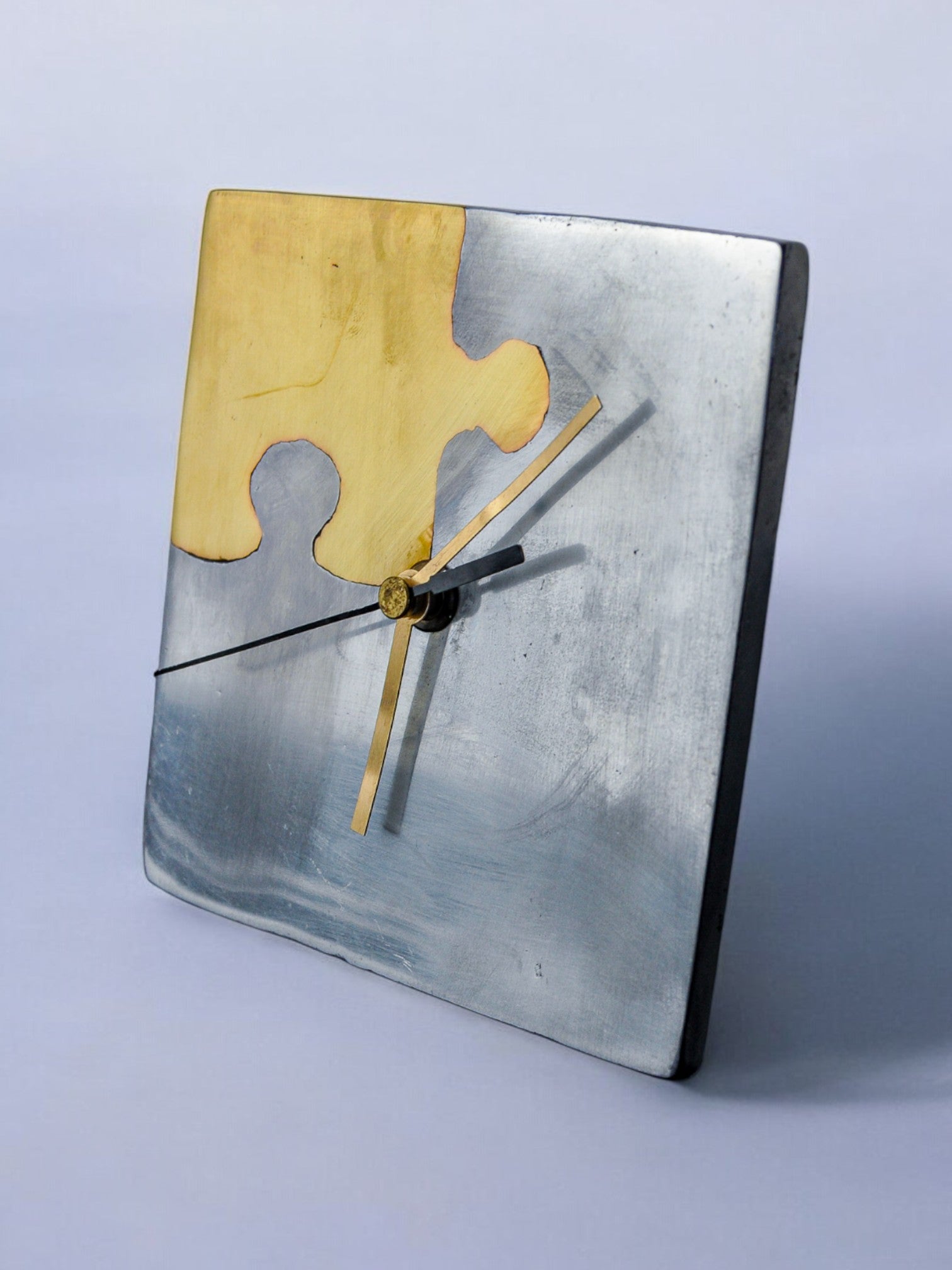 Brutalist clock "Puzzle" by Art3, brass and aluminum, Spain, 1980