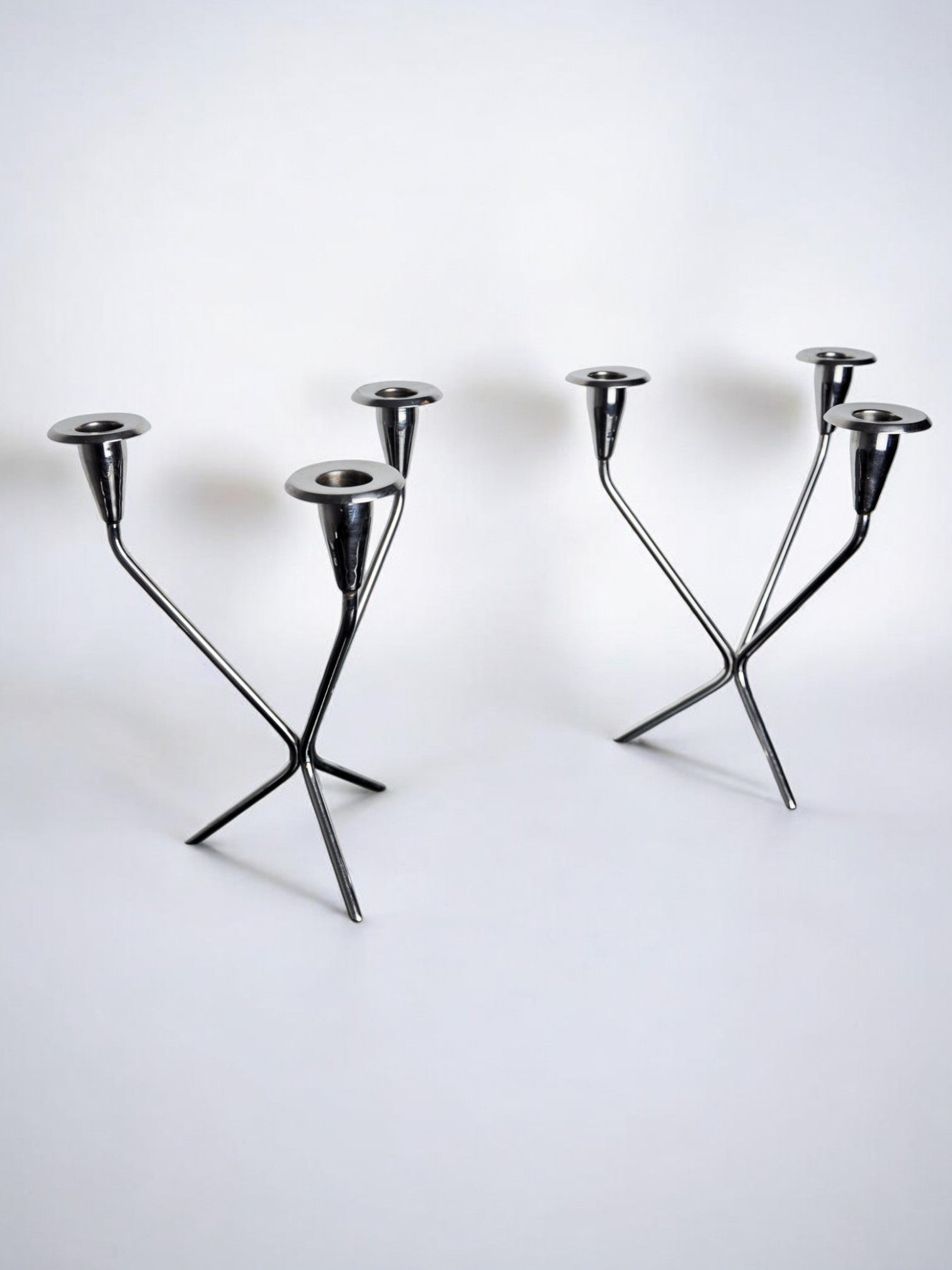 Pair of art deco stainless steel 3-flame candlesticks, Spain, 1970