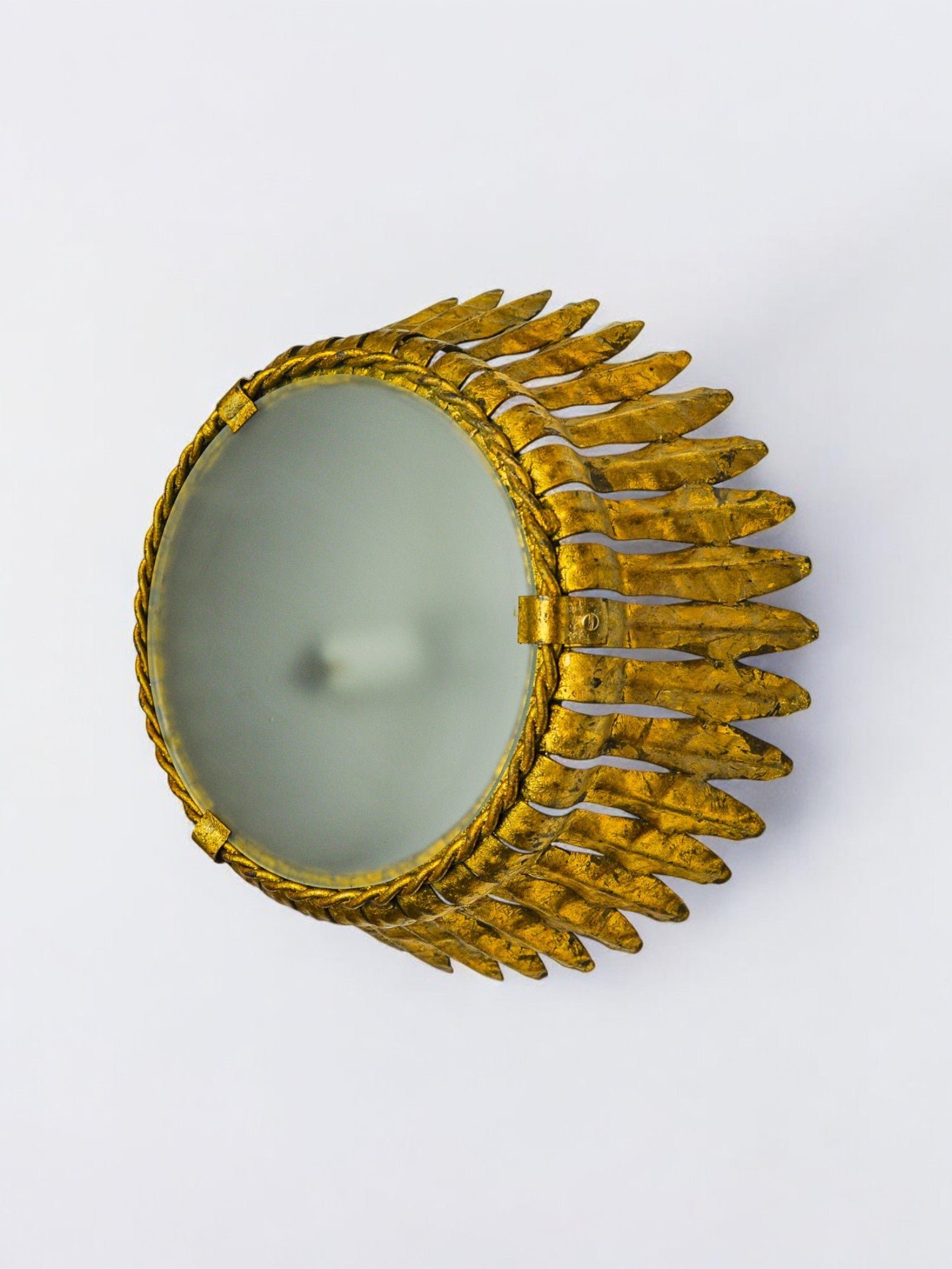 Sun wall lamp by ferro arte, metal and gold leaf, Spain, 1960