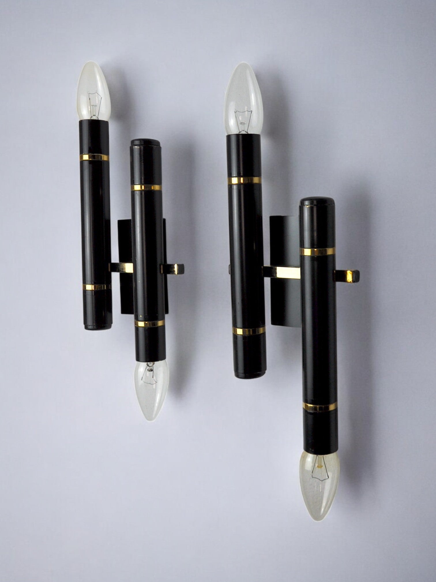 Pair of tubular sconces from the sciolari house, italy, 1970s