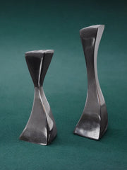 Pair of Swan candlesticks by Matthew Hilton, England, 1980