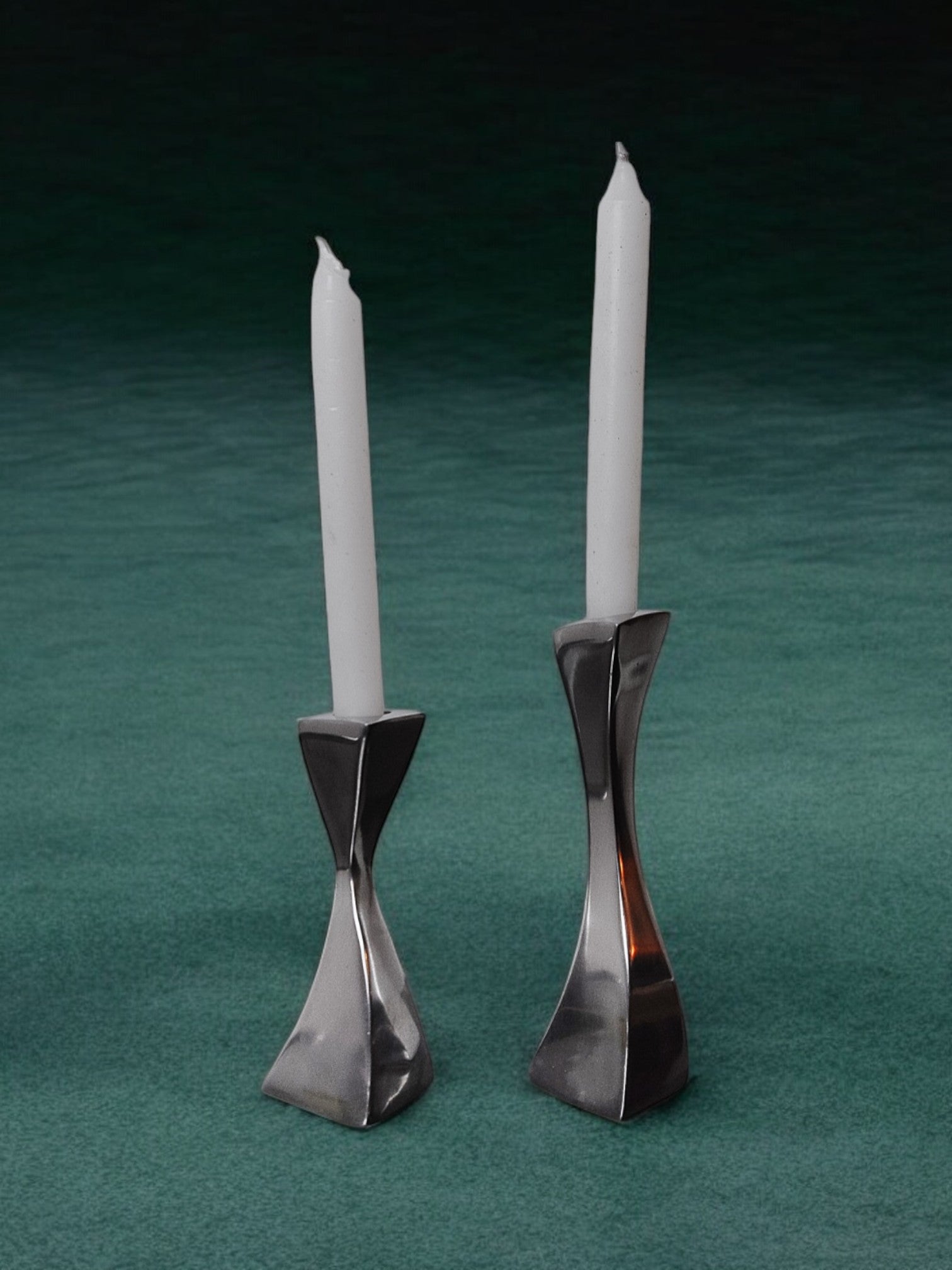 Pair of Swan candlesticks by Matthew Hilton, England, 1980