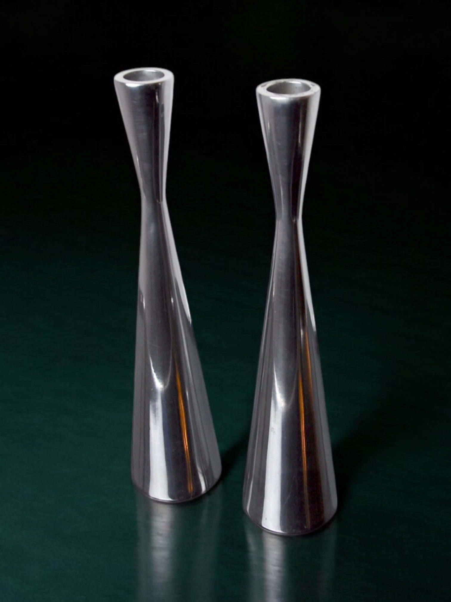 Pair of Scandinavian diabolo candlesticks, aluminium, suede, 1970