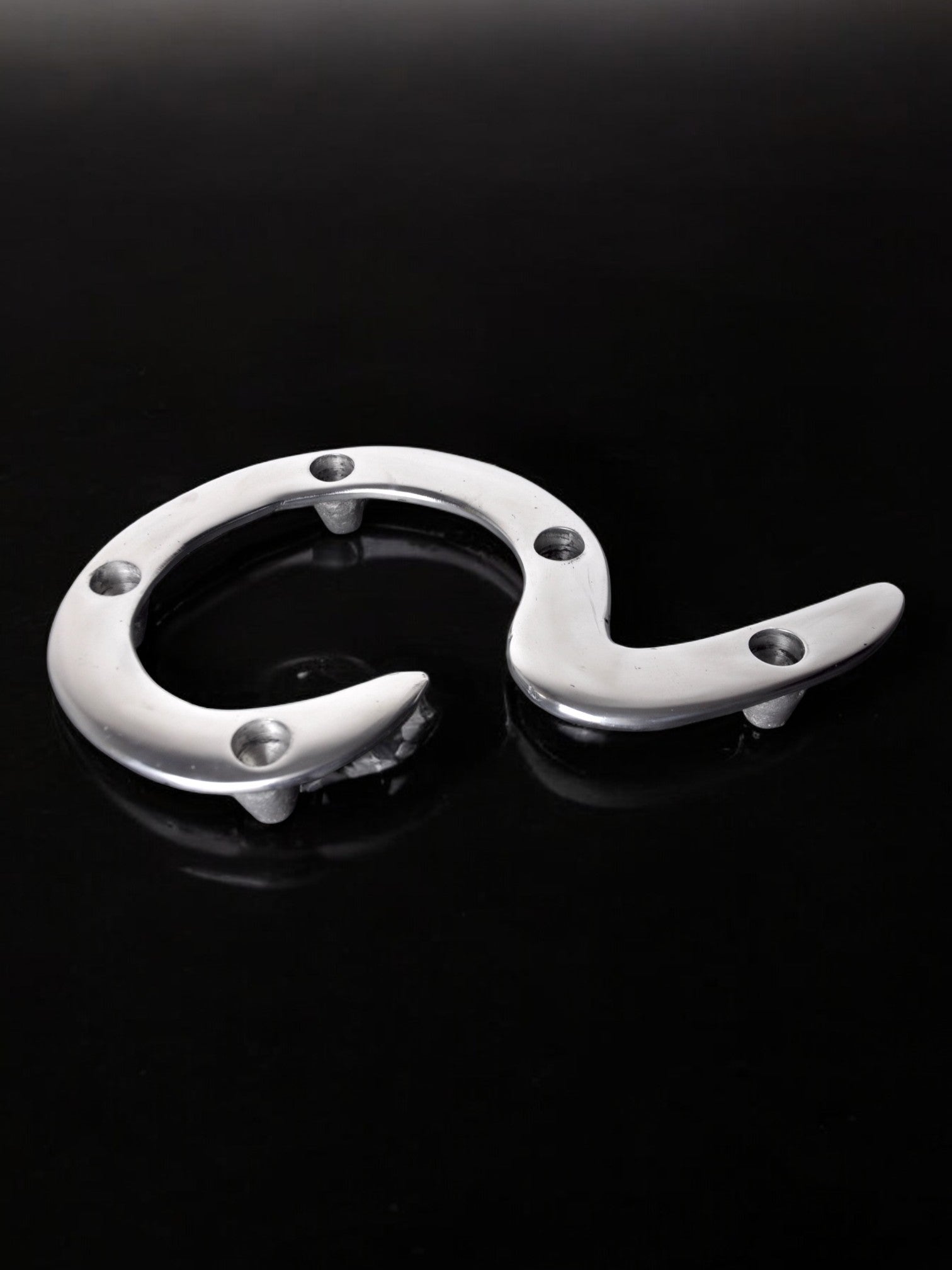 Biomorphic candleholder, solid aluminum, Italy, 1980's