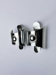 Pair of space age wall lights, chromed metal, Italy, 1970