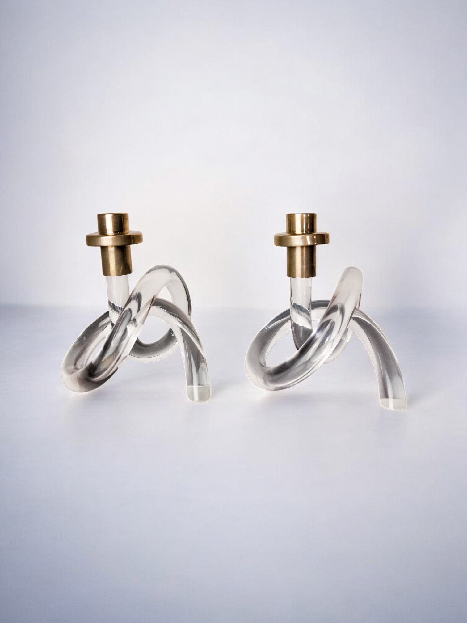 Pair of pretzel candlesticks by Dorothy Thorpe, Lucite and Gilt brass, 1970's