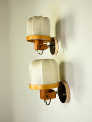 Pair of articulated "Cocoon" wall lights, resin and pine, Italy, 1970's