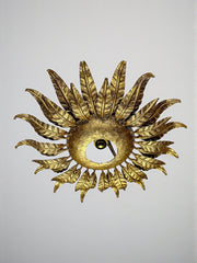 Spanish Sunburst ceiling light fixture or sconce in Gilt Wrought Iron, Circa 1950's