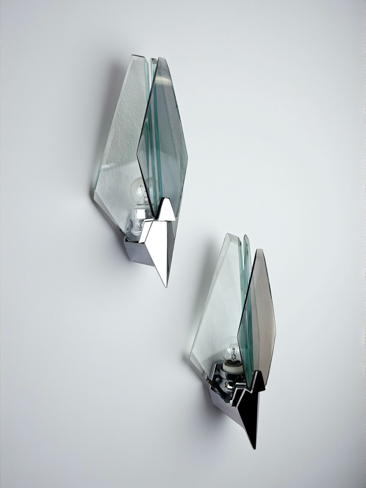 Pair of Veca sconces, murano blue cut glass & black lucite, Italy, Circa 1970's
