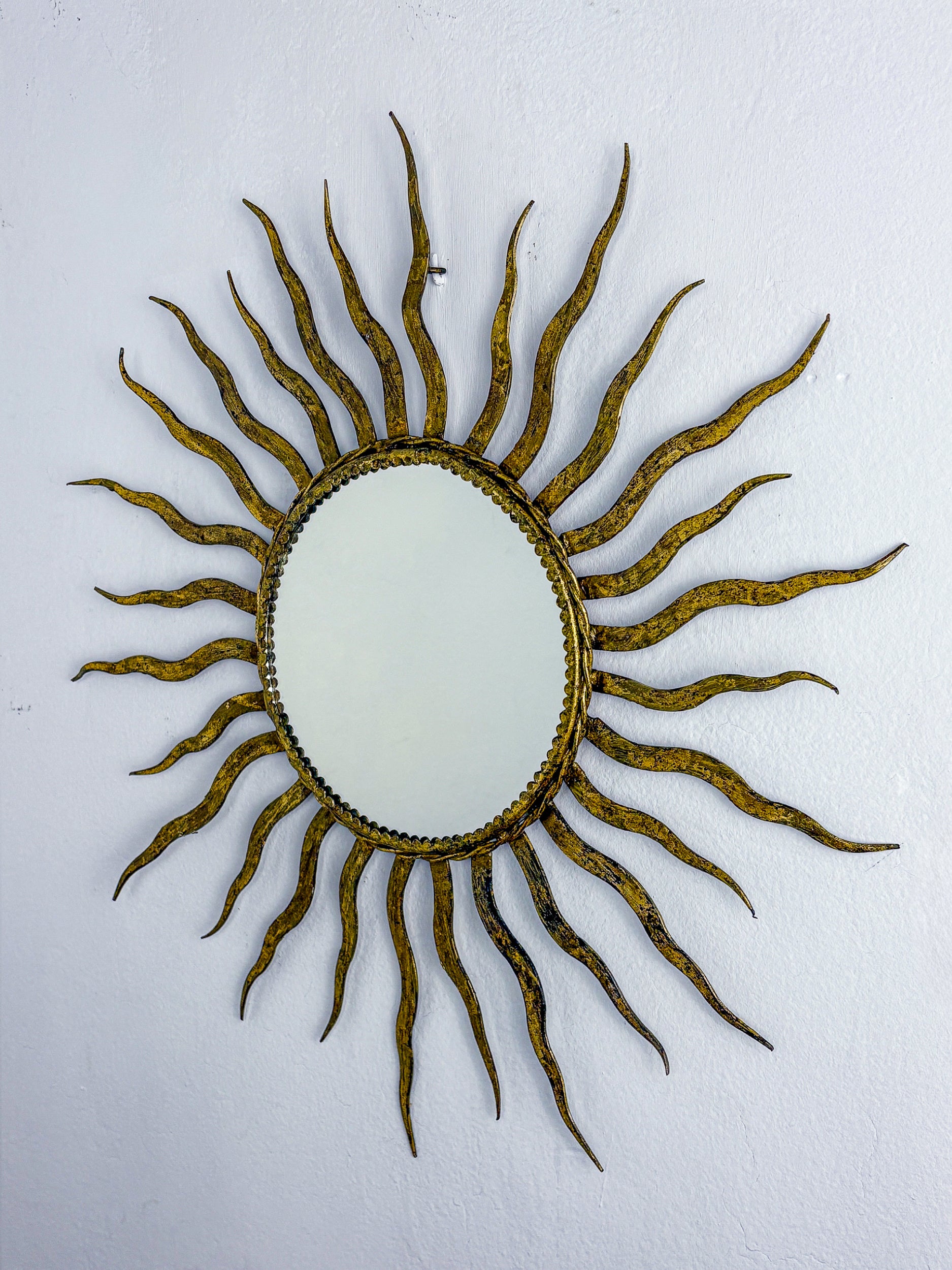 French Sunburst Starburst Mirror in Gilt Iron, 1950's