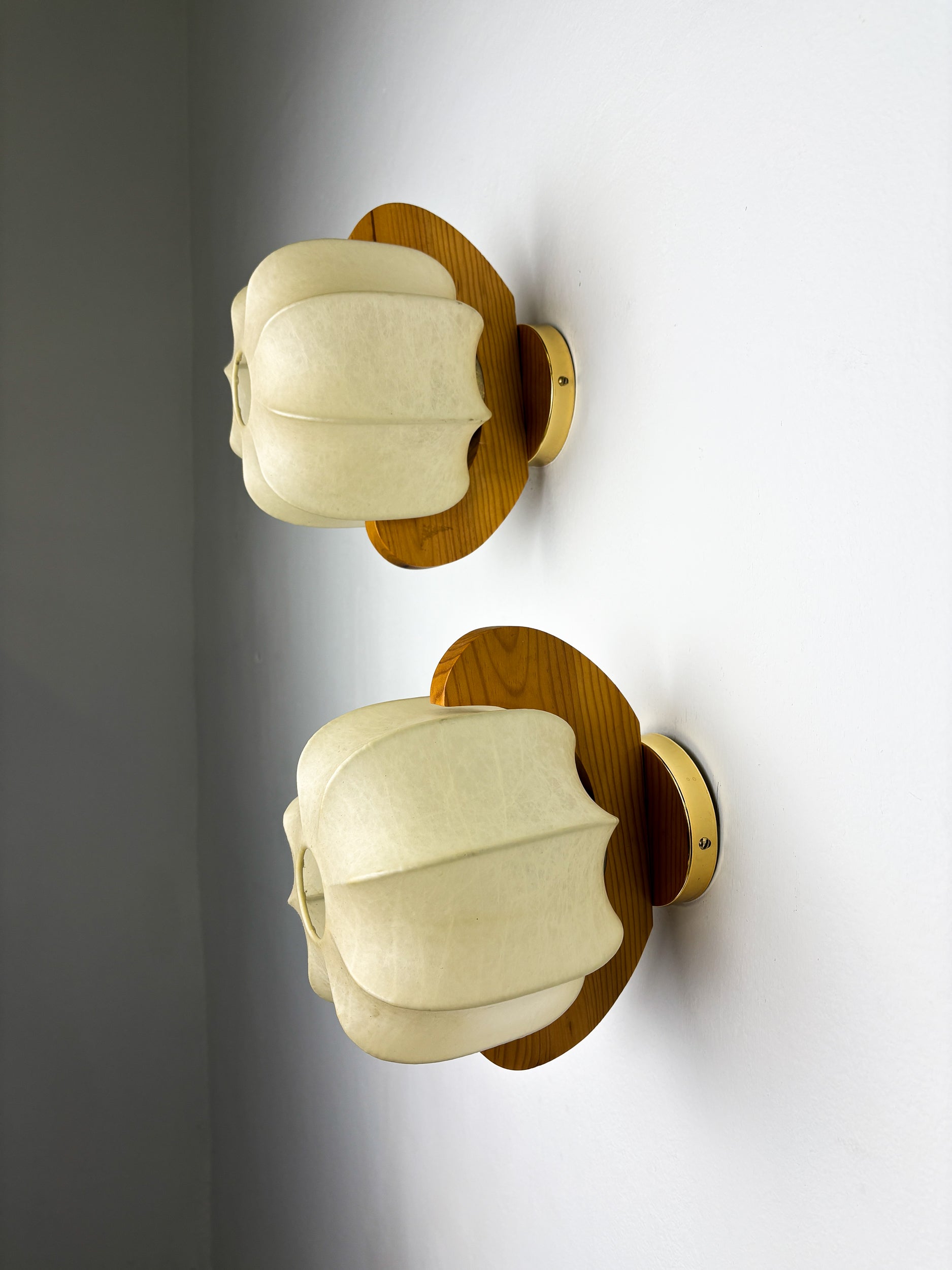 Pair of cocoon sconces with pine, Italy, 1970s