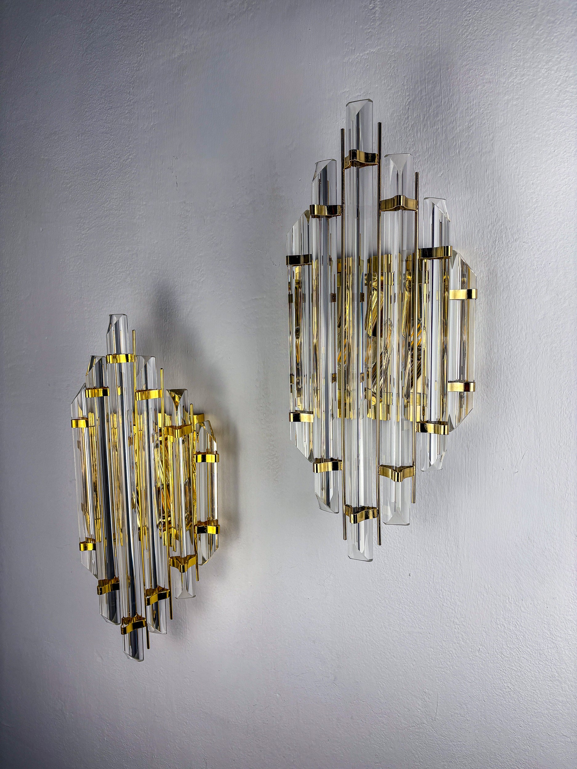 Pair of large Venini sconces, Triedi cut Glass, Italy, Circa 1970's