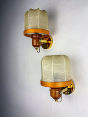 Pair of Italian articulated "Cocoon" wall lights, resin and pine, 1970's