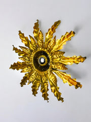 Brutalist sun wall lamp, metal and gold leaf, Italy, 1960