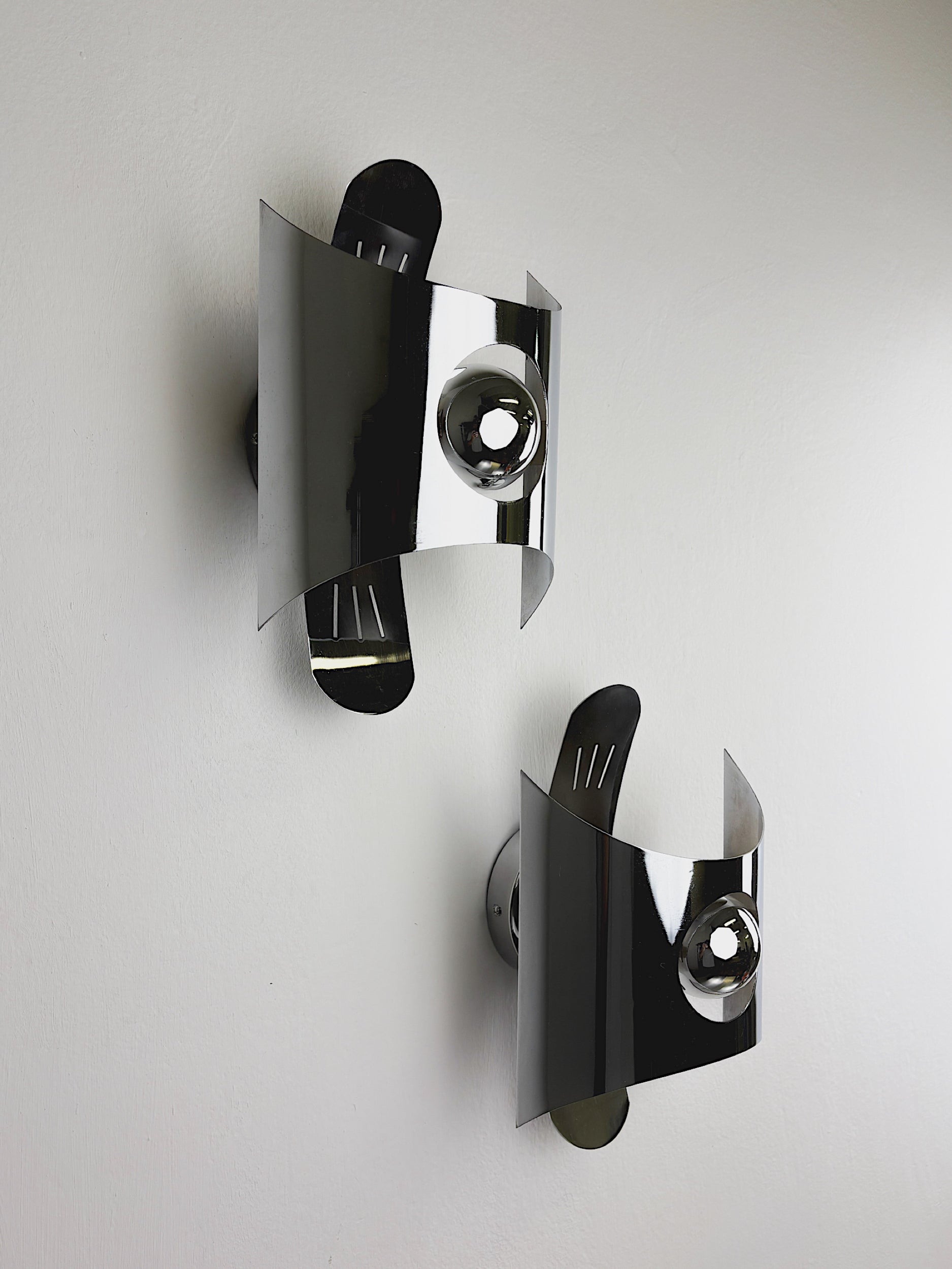 Pair of chromed space age wall lights, Italy, 1970's