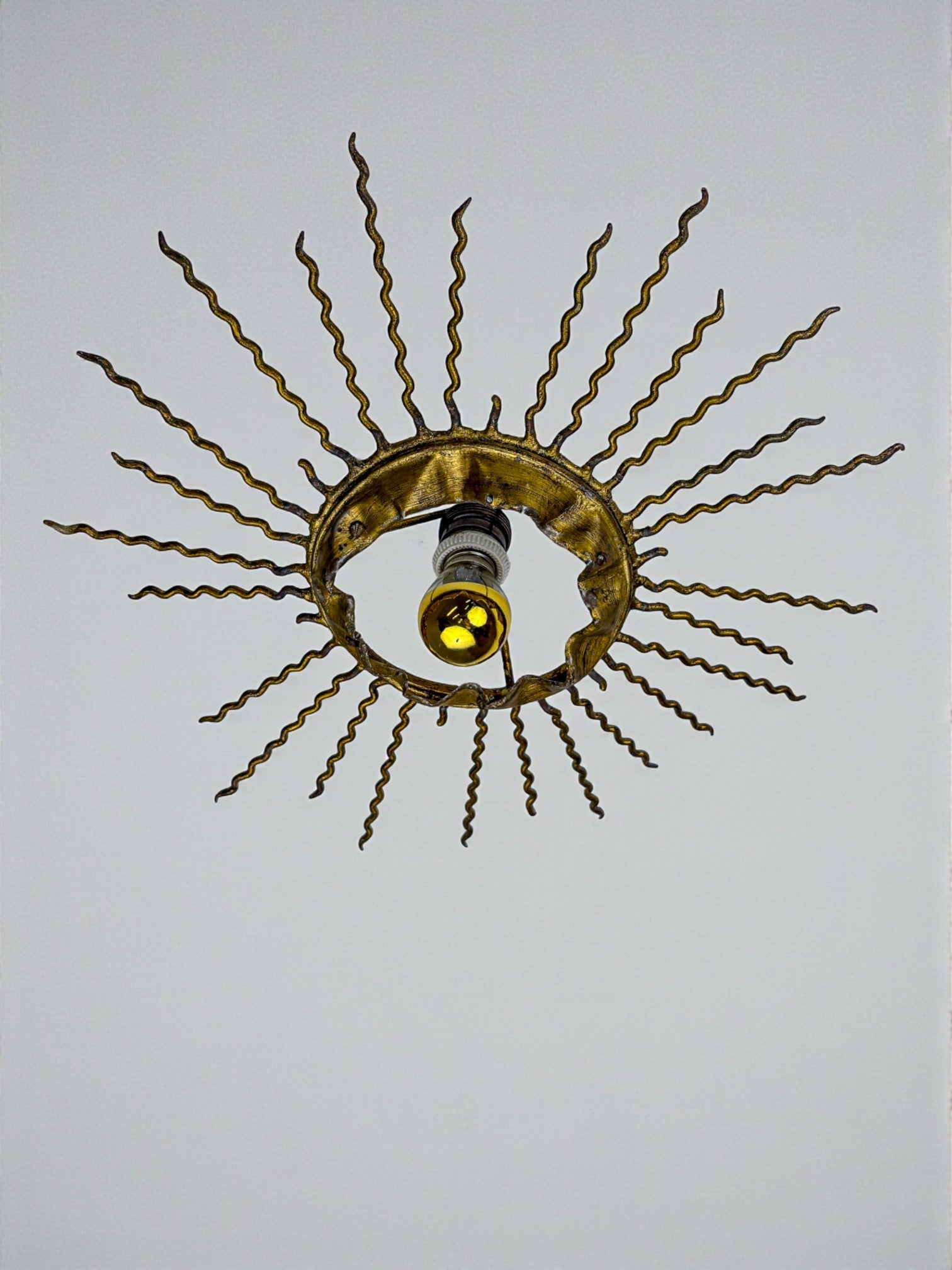 Spanish Sunburst Ceiling Light – Gilt Iron Rays & Exposed Bulb, 1960s