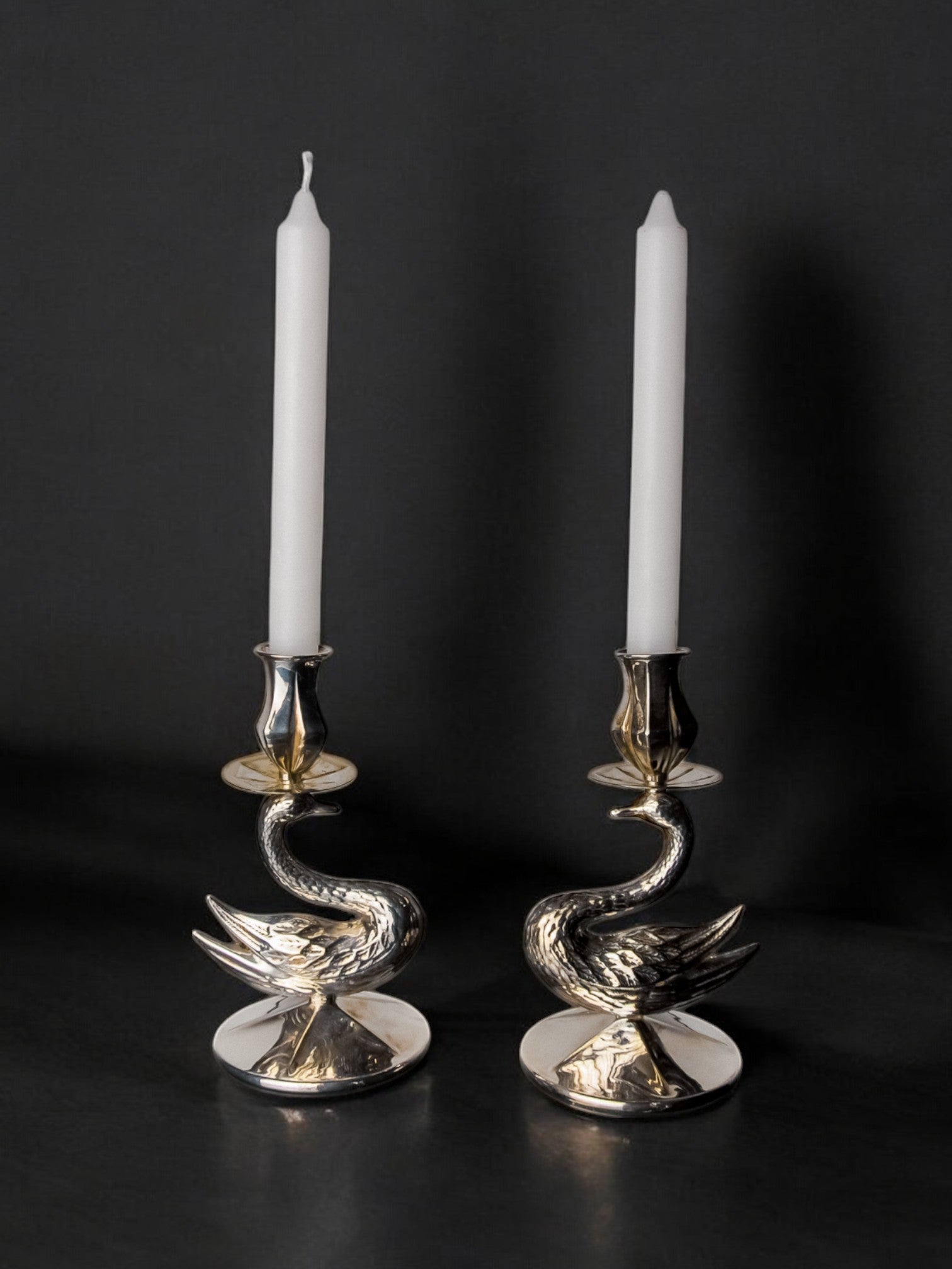 Pair of art deco swan candlesticks in alpaca, Spain, 1970