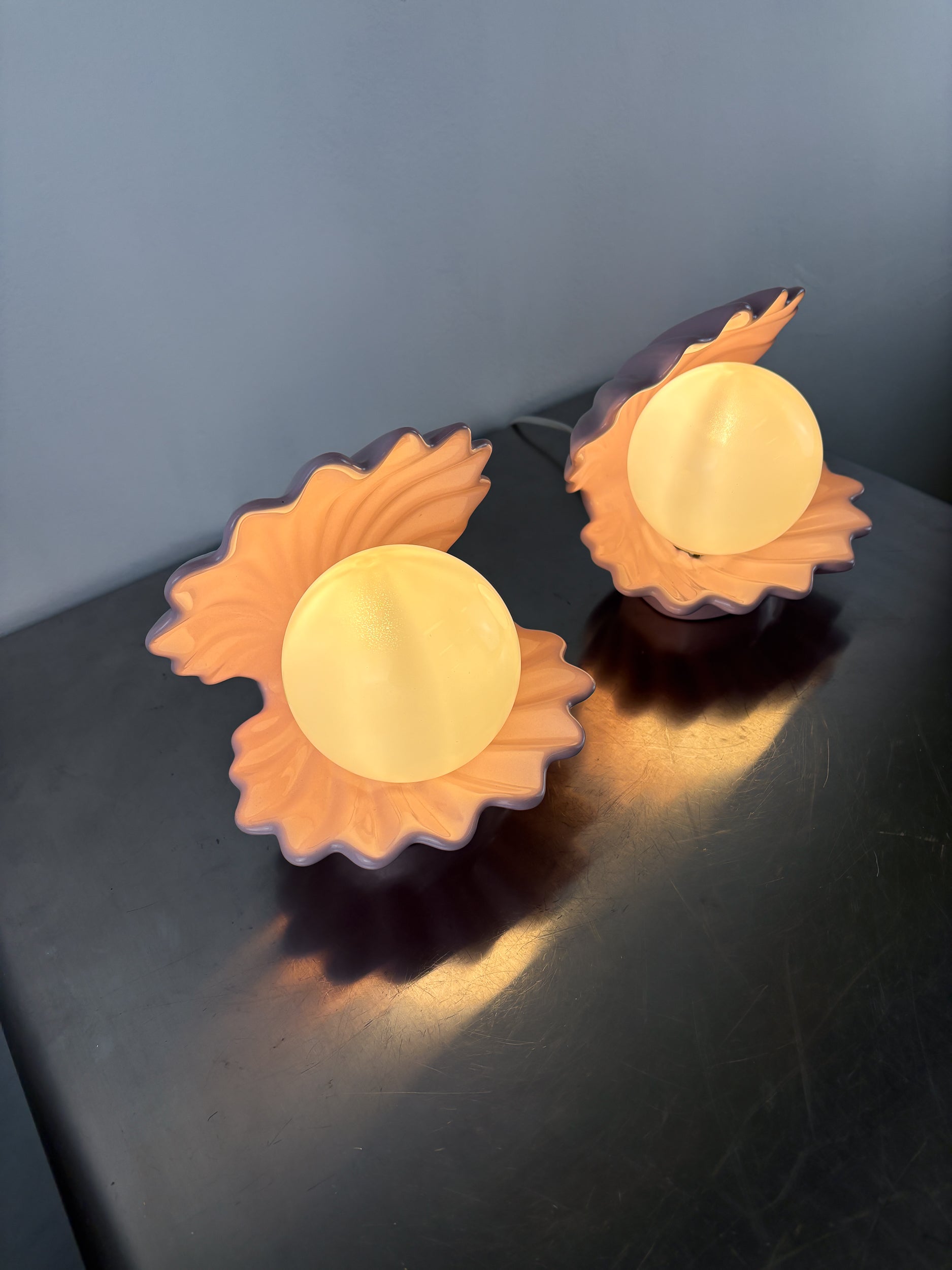 Pair of pink ceramic shell-shaped table lamps, Italy, 1970s