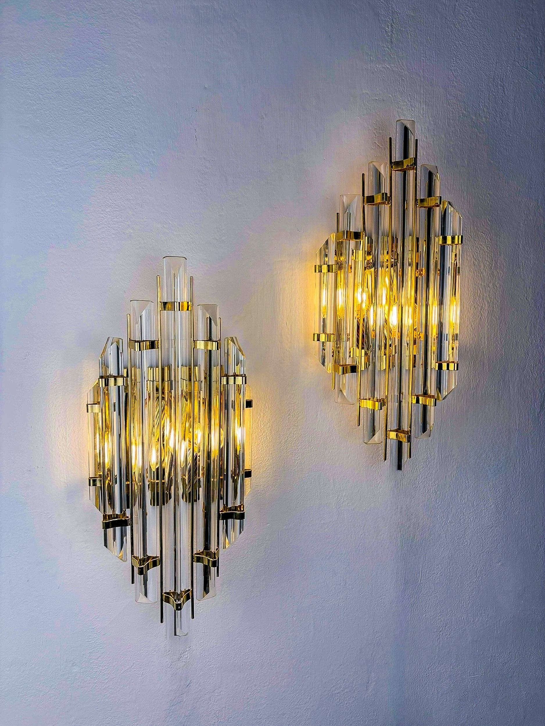 Pair of large Venini sconces, Triedi cut Glass, Italy, Circa 1970's