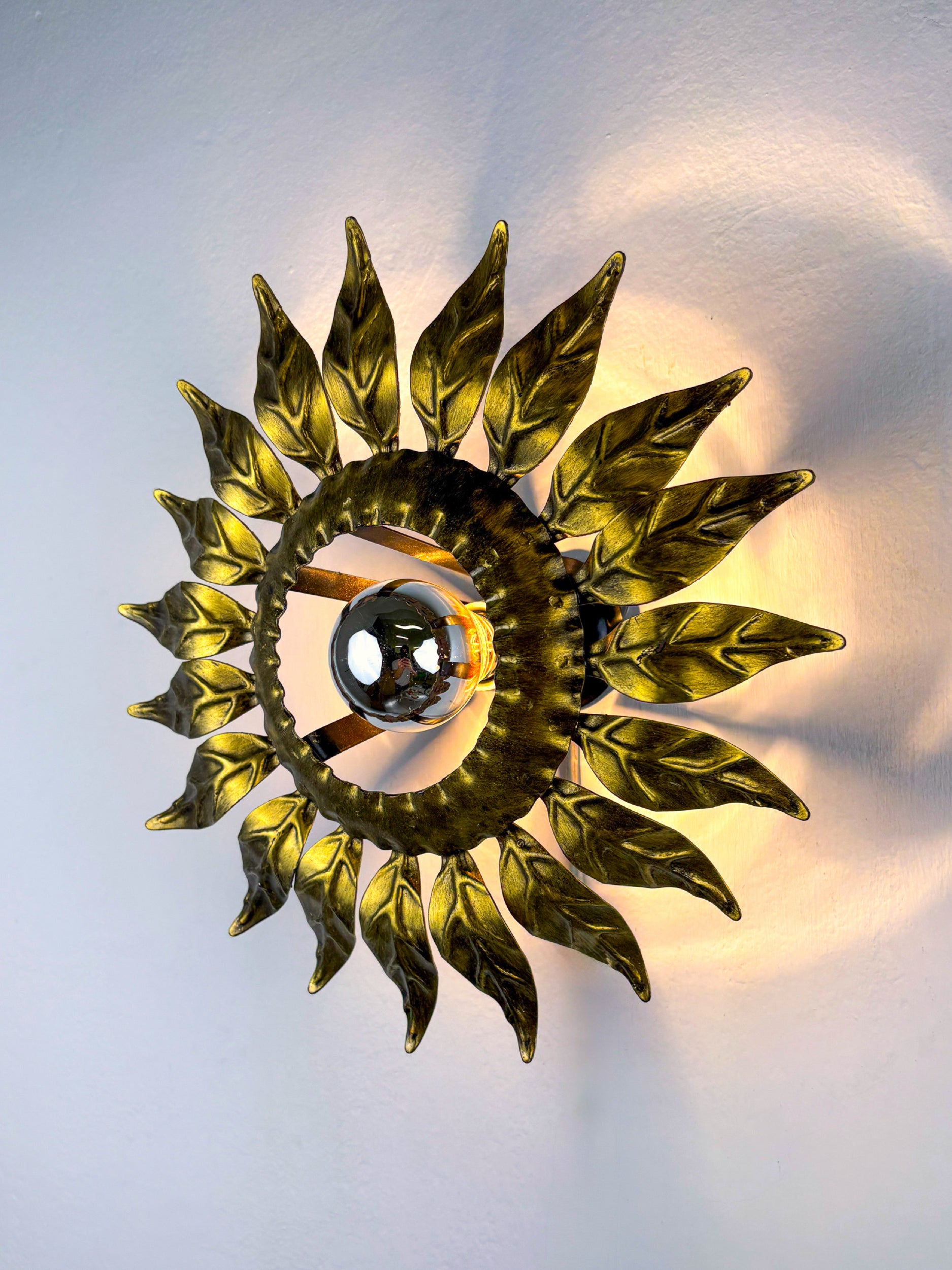 Sunburst ceiling light fixture or sconce in Gilt Wrought Iron, Spain, Circa 1960's