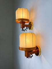 Pair of articulated "Cocoon" wall lights in resin and pine, Italy, Circa 1970's