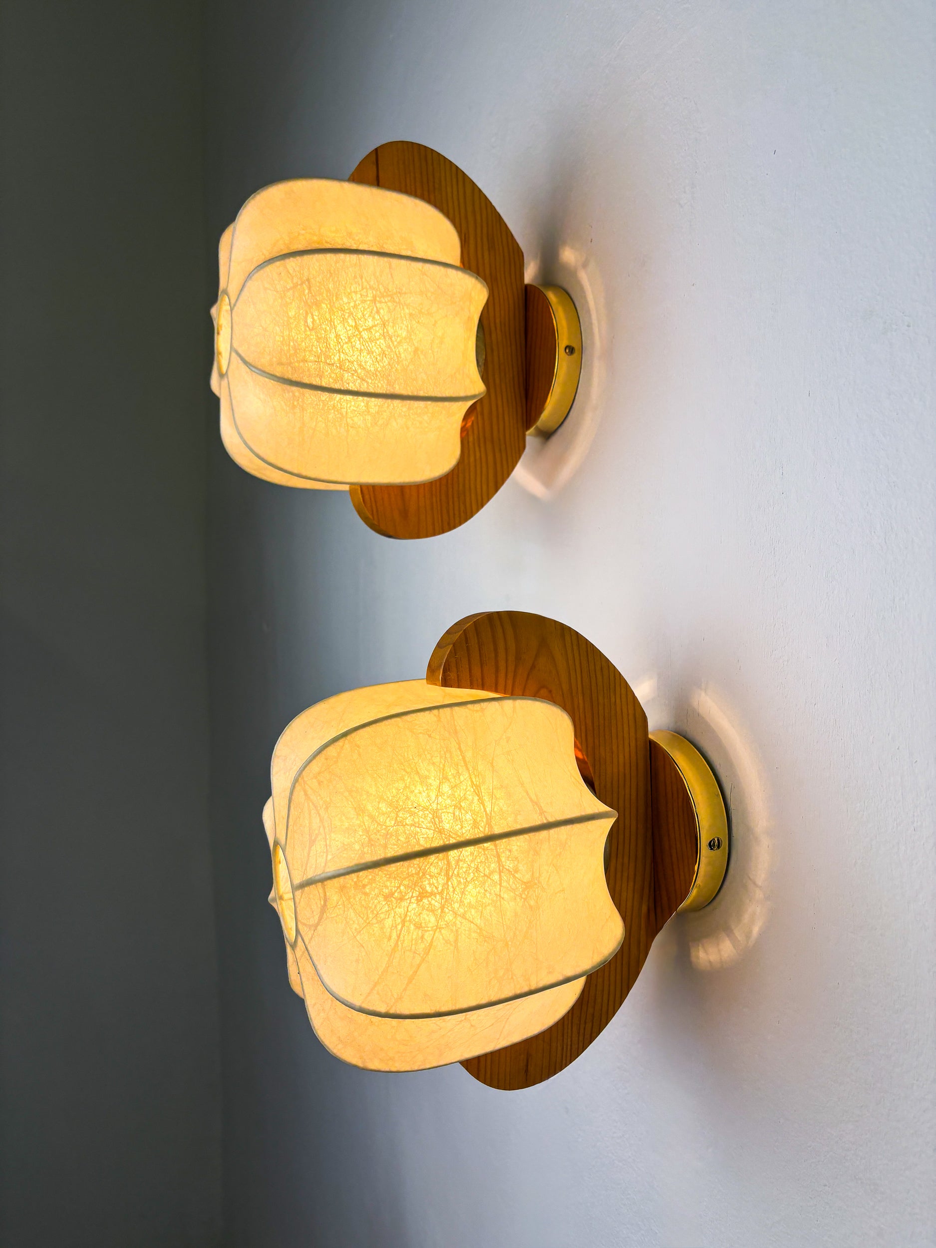 Pair of cocoon sconces with pine, Italy, 1970s