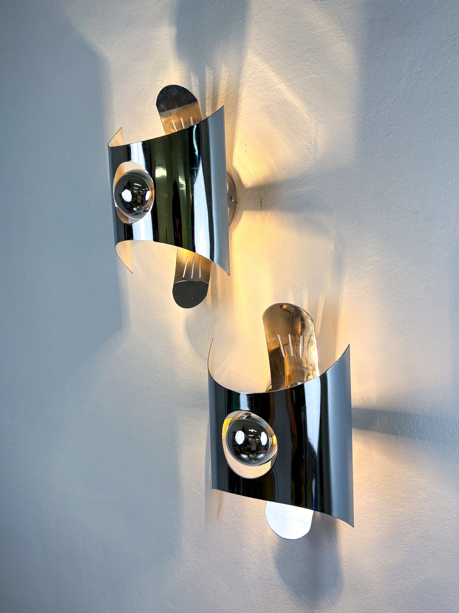 Pair of chromed space age wall lights, Italy, 1970's