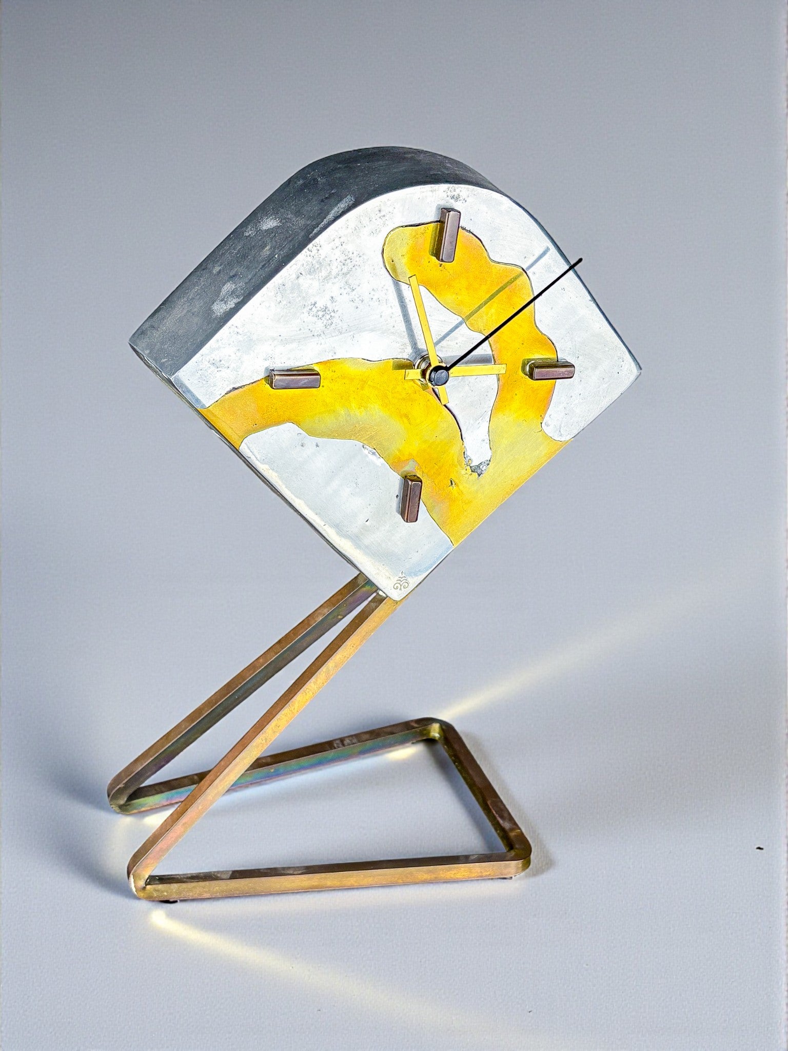 Brutalist clock by Leopold, bronze and aluminum, 1970, Spain