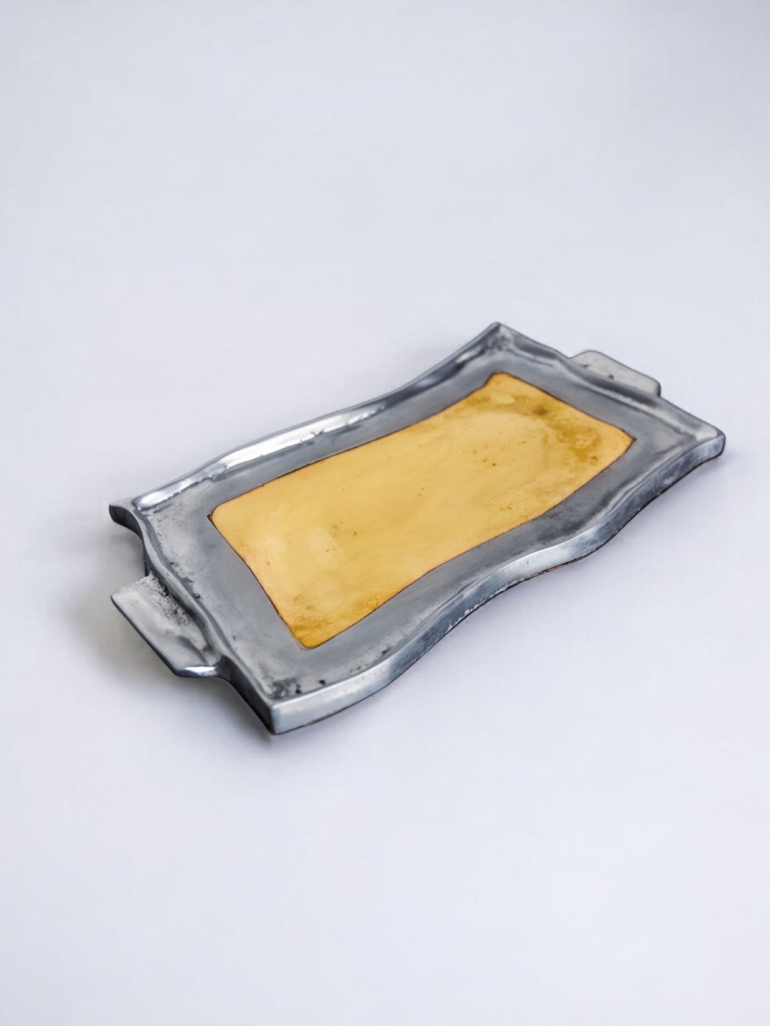 Brutalist pocket emptier by Leopold, bronze and aluminum 1970, Spain