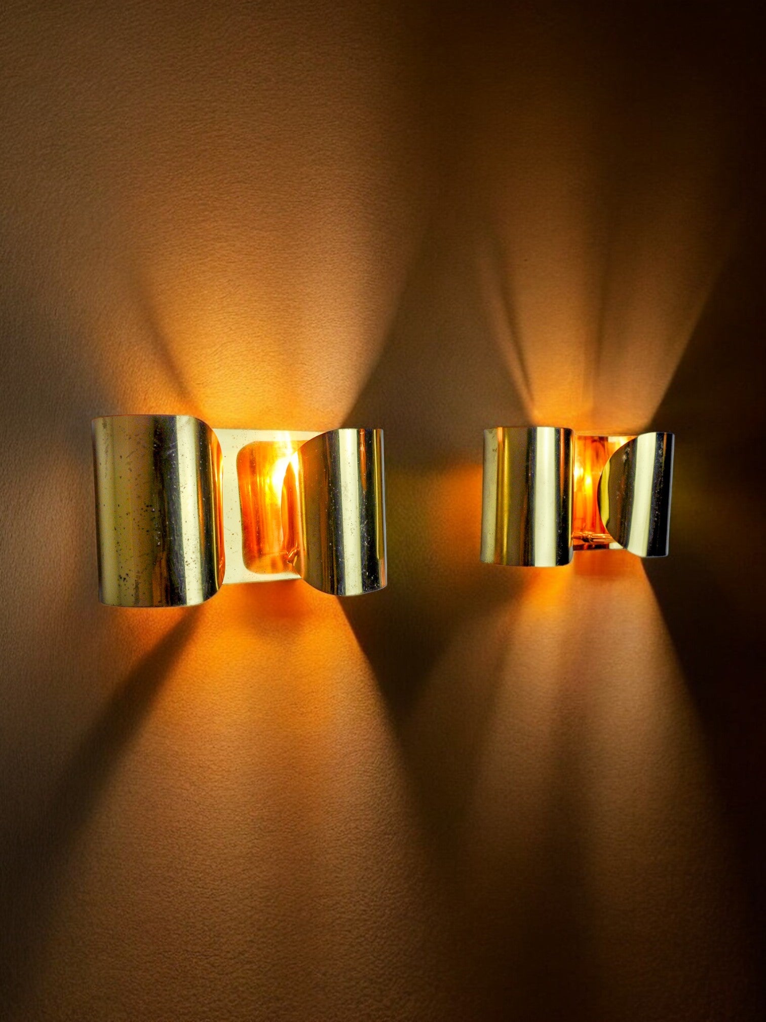 Pair of "Foglios" brass wall lights, Italy, 1970
