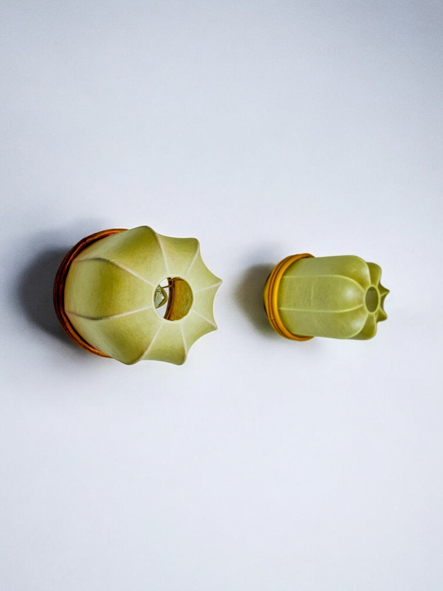 Pair of "cocoon" wall lights, resin and pine, Italy, 1970