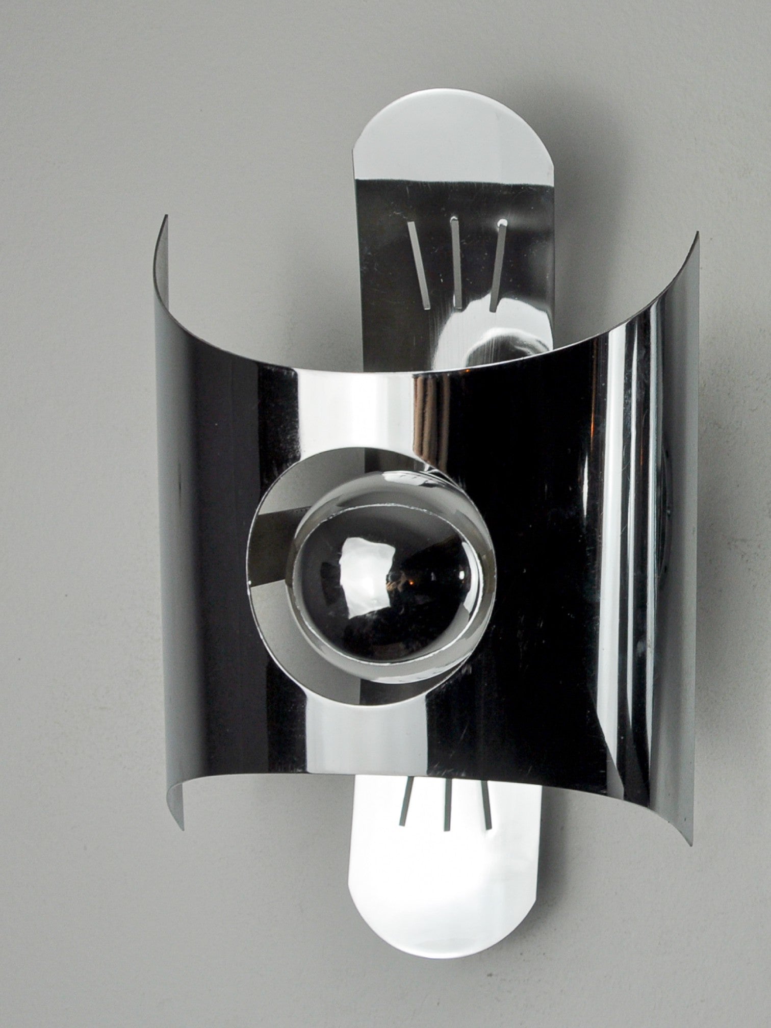 Pair of space age wall lights, chromed metal, Italy, 1970