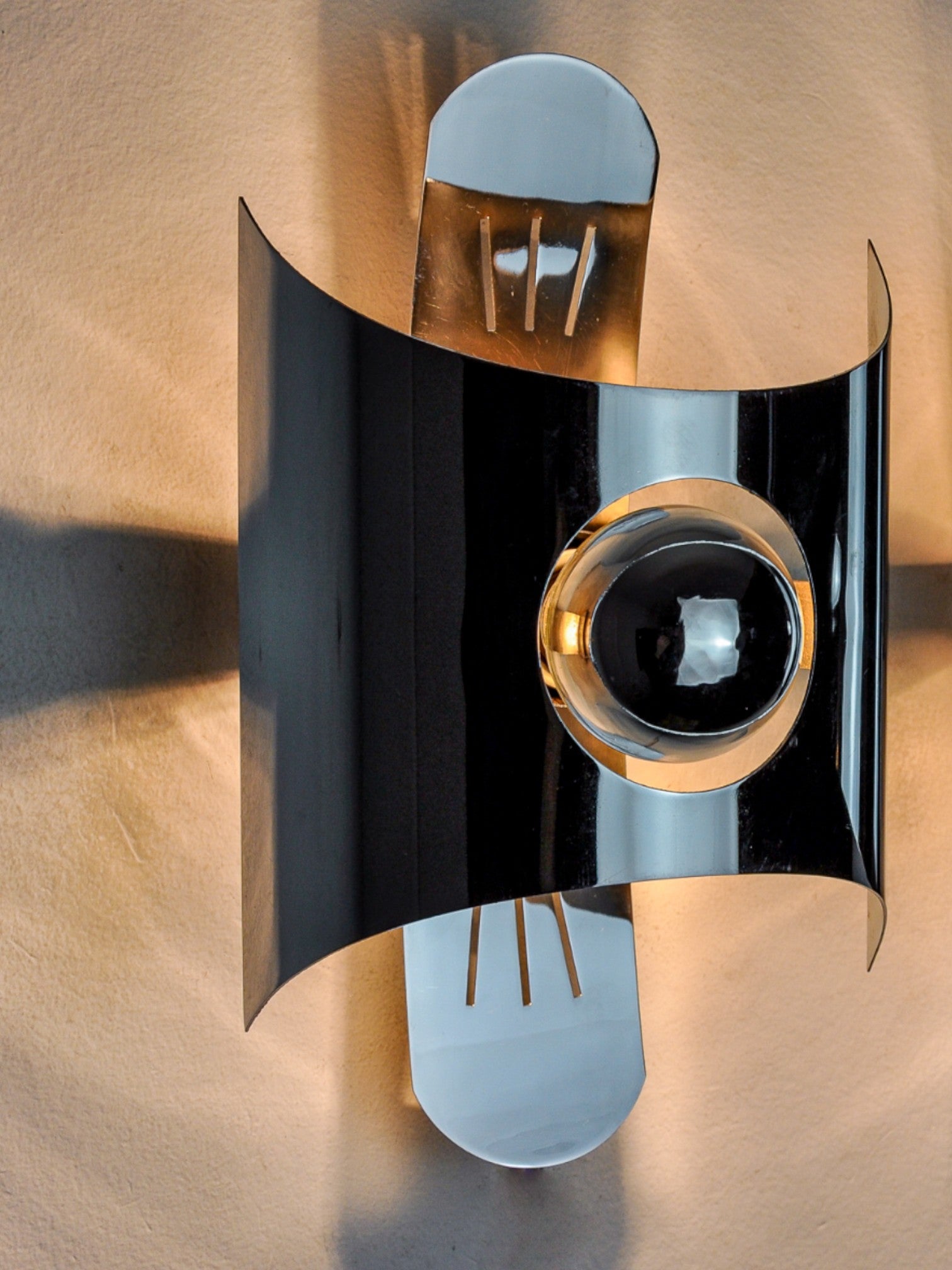 Pair of space age wall lights, chromed metal, Italy, 1970