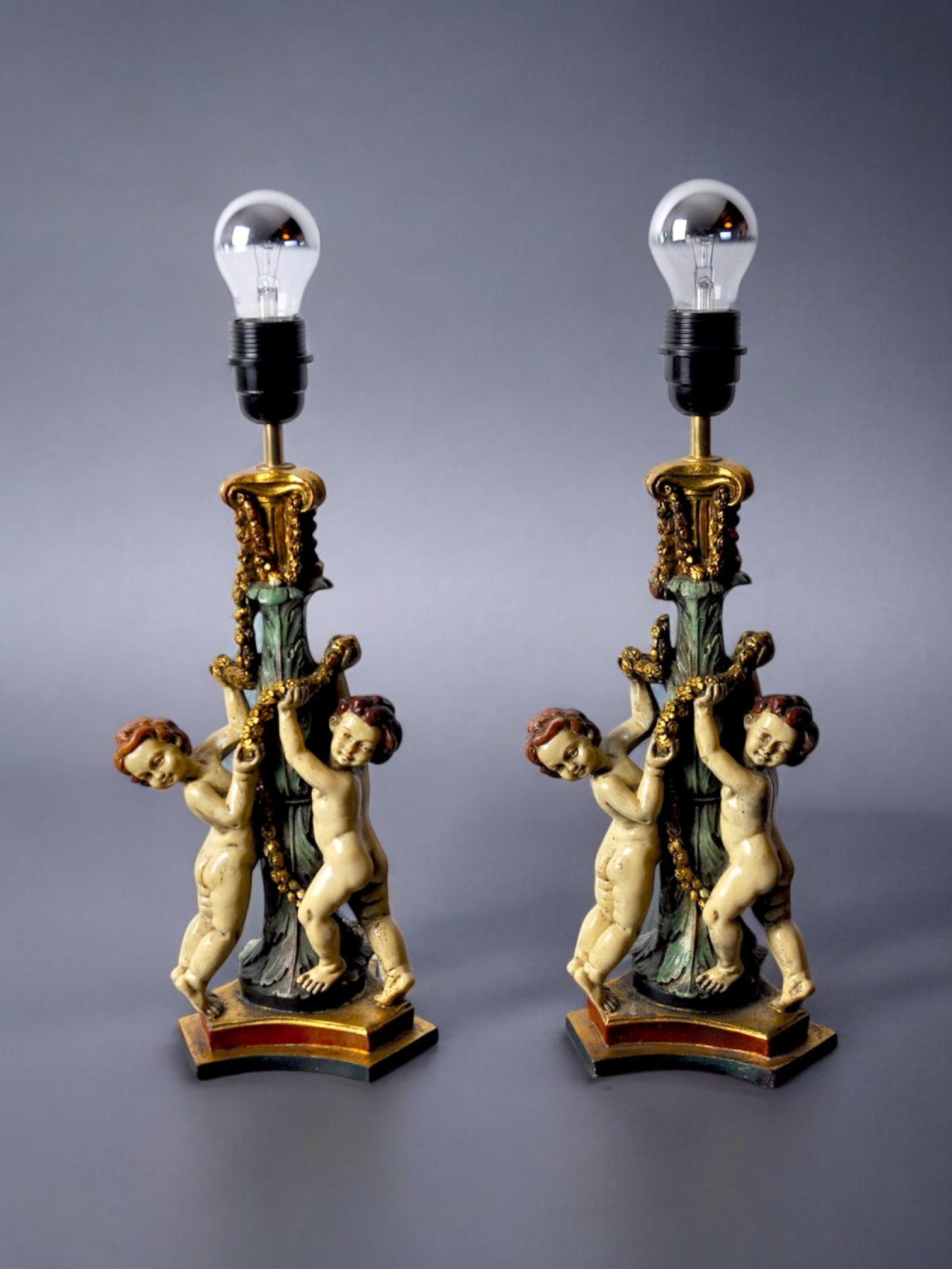 Barrocco Resin Cherubo Lamps, a pair,  France, 1970