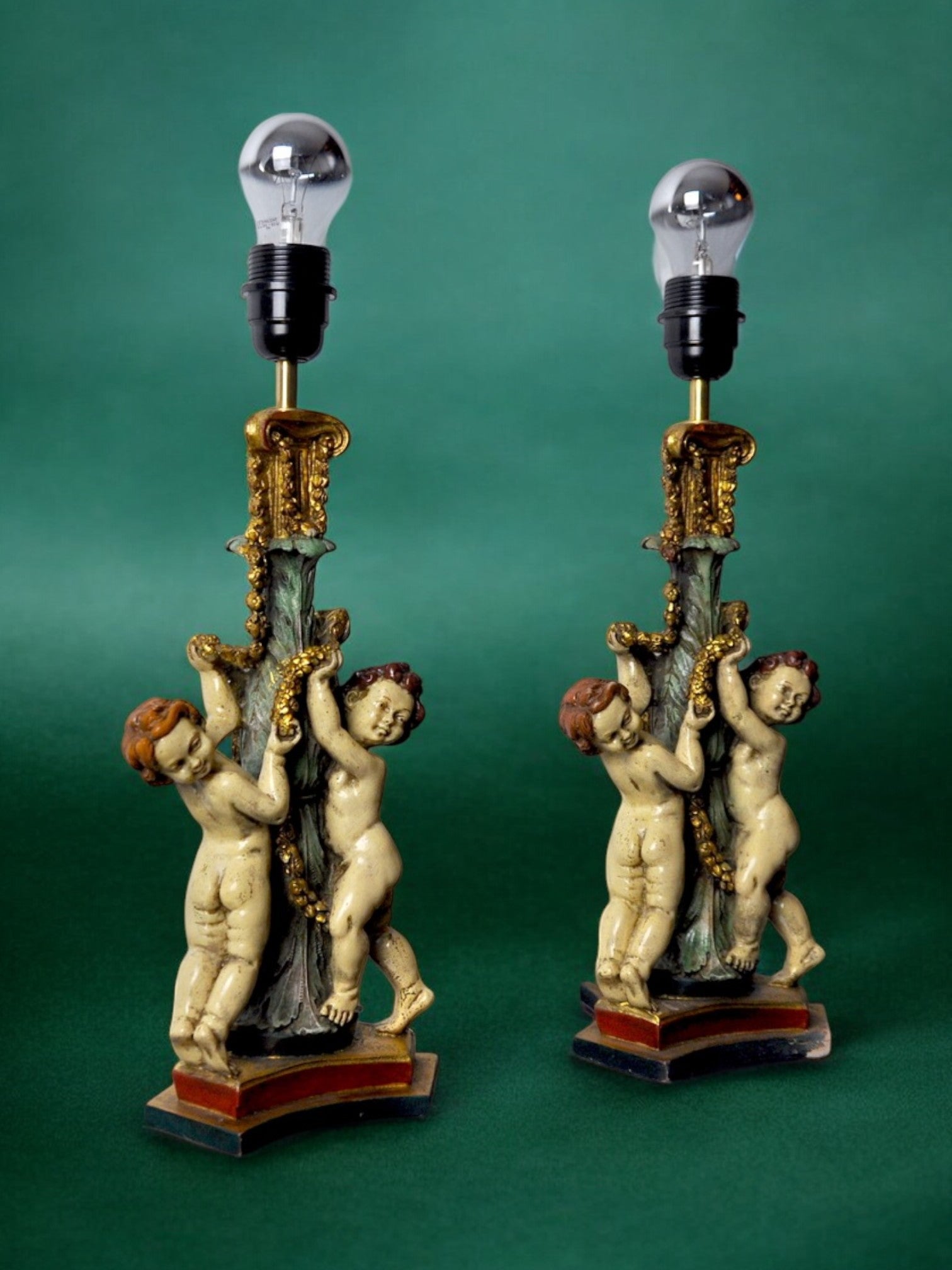 Barrocco Resin Cherubo Lamps, a pair,  France, 1970
