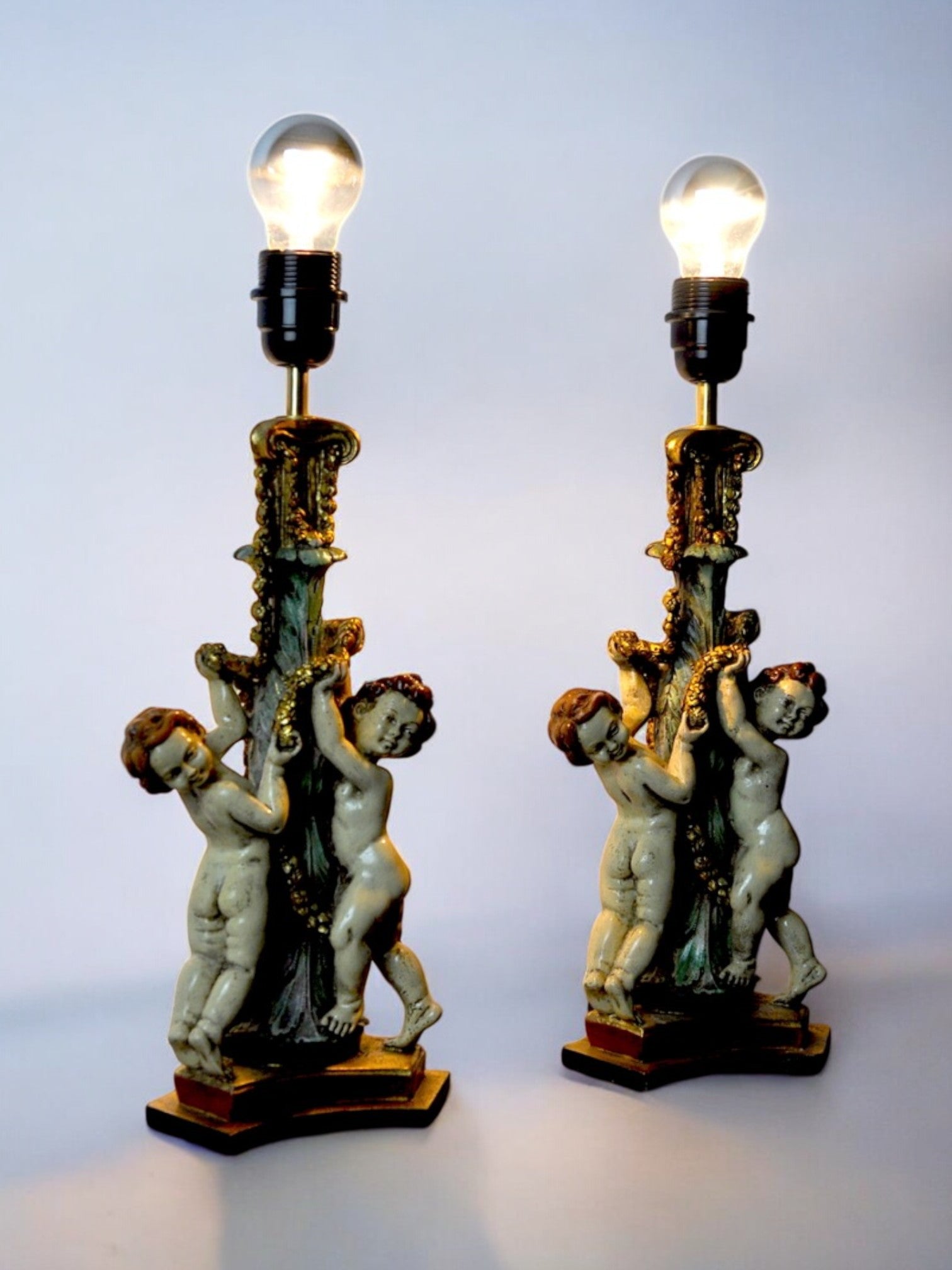 Barrocco Resin Cherubo Lamps, a pair,  France, 1970