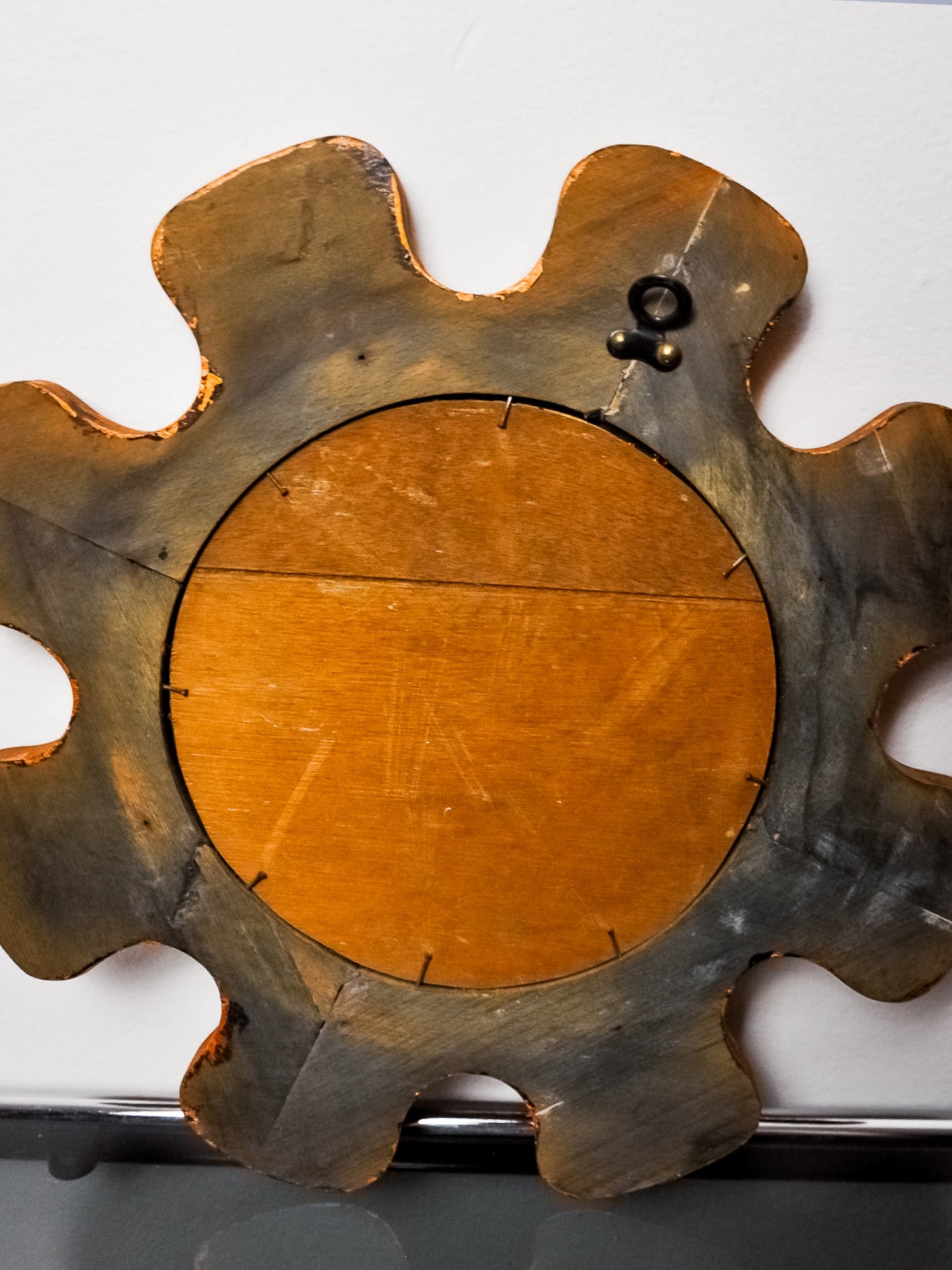 Sun shaped Modernist enamel mirror by J. Capo Esmaltes, Spain, 1970's