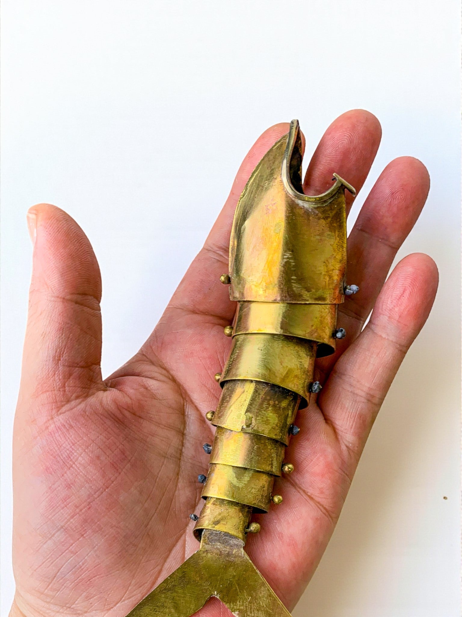 Brutalist articulated Fish bottle opener in brass, Mexico, Circa 1980's