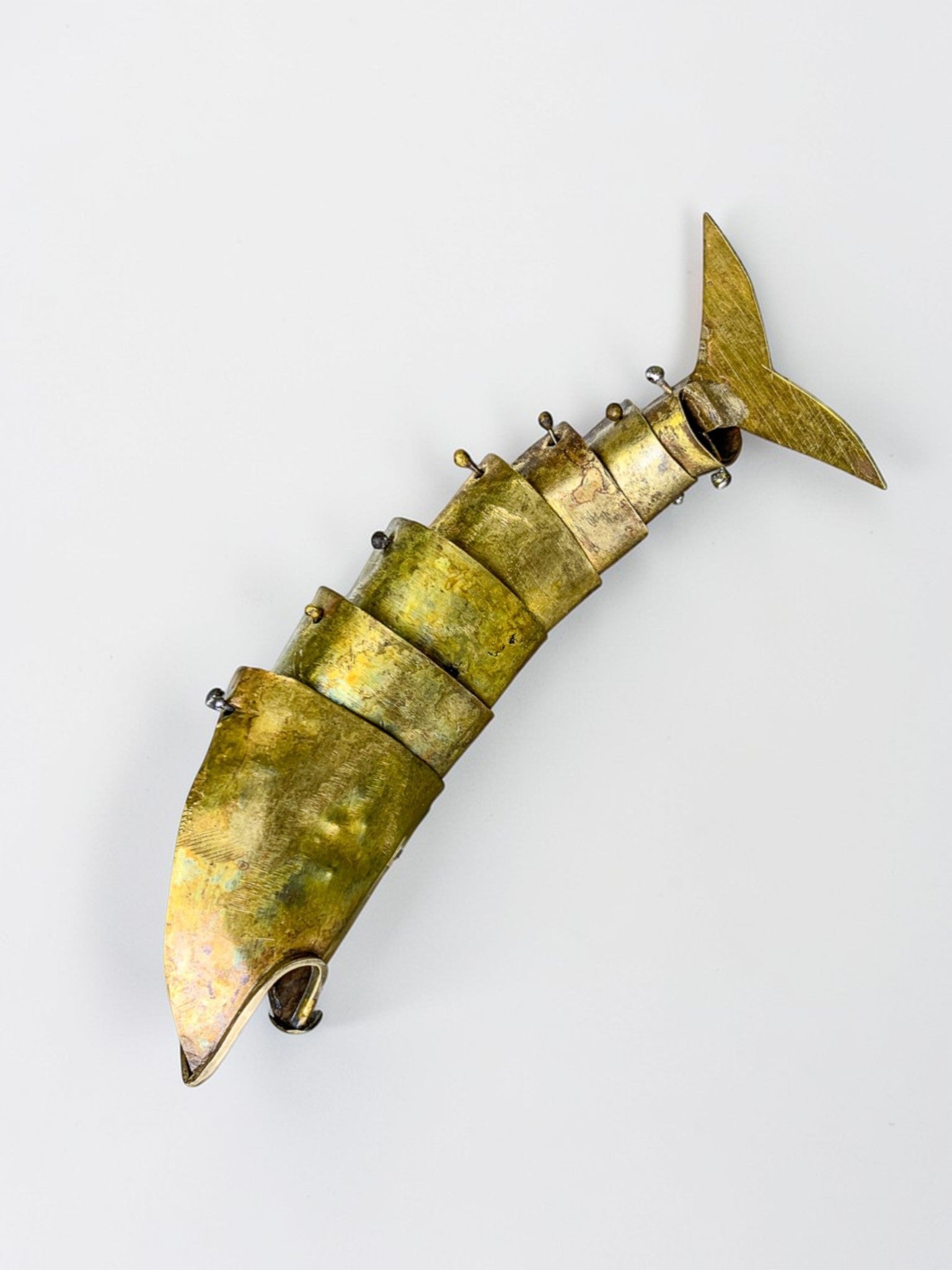 Brutalist articulated Fish bottle opener in brass, Mexico, Circa 1980's