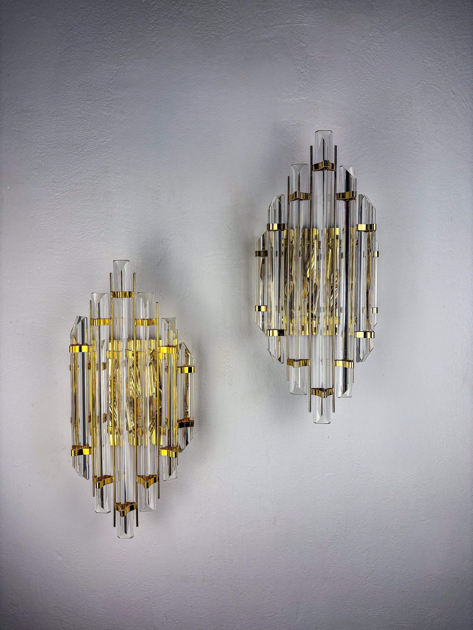 Pair of large Venini sconces, Triedi cut Glass, Italy, Circa 1970's