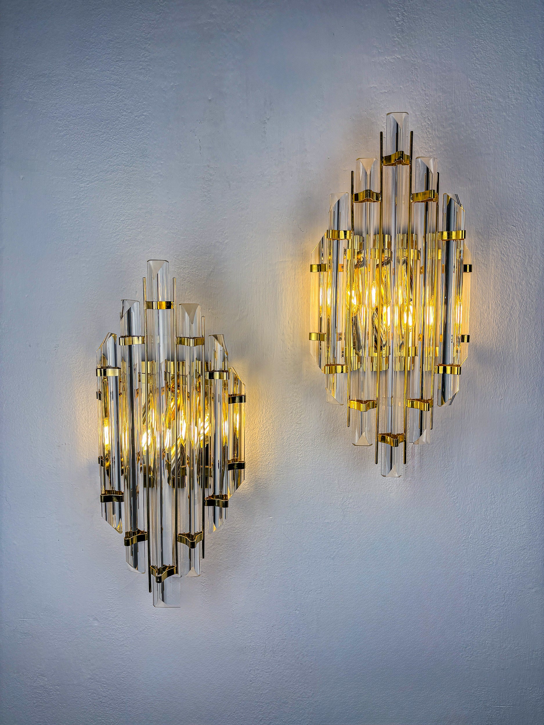 Pair of large Venini sconces, Triedi cut Glass, Italy, Circa 1970's