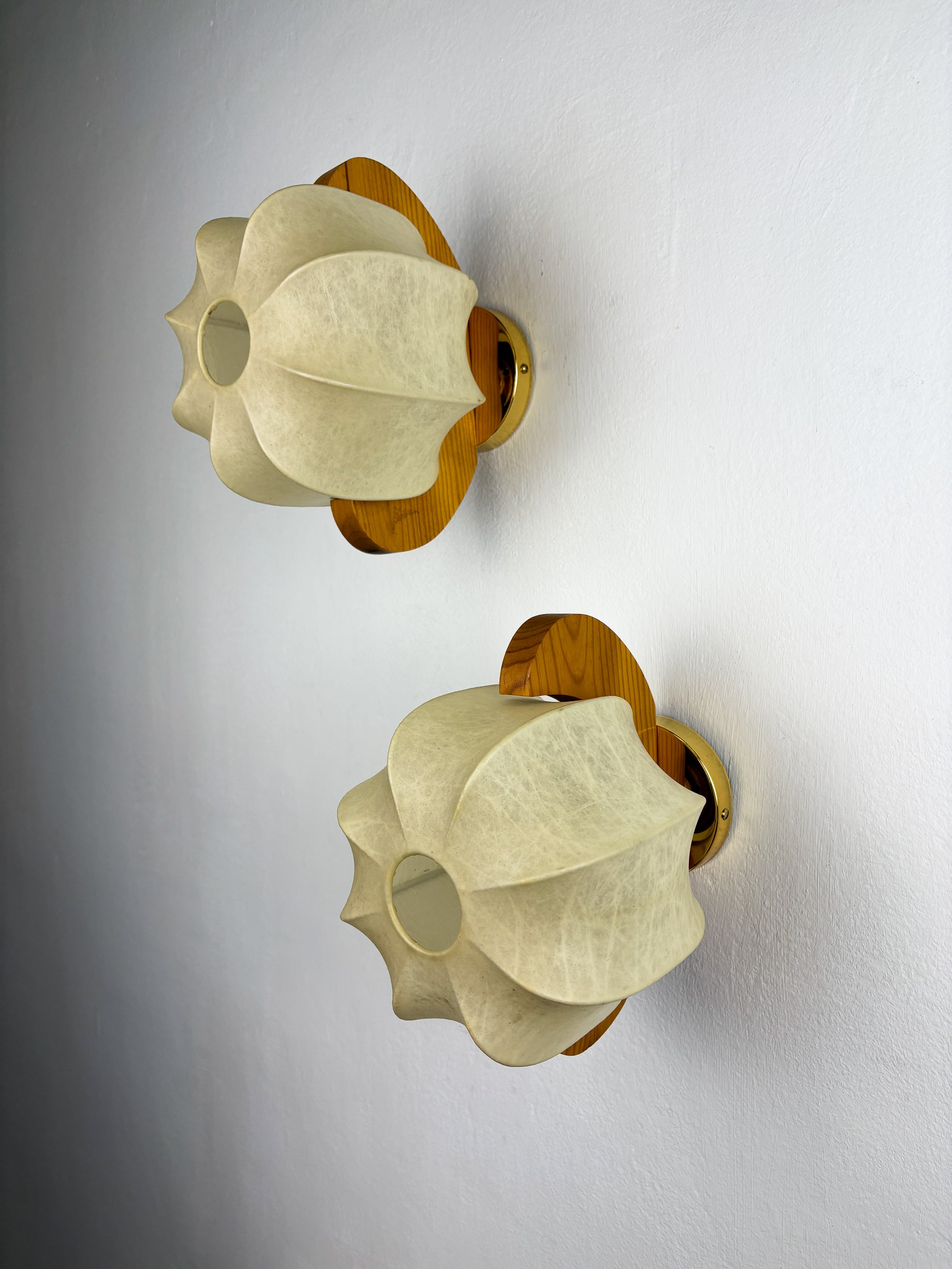 Pair of cocoon sconces with pine, Italy, 1970s