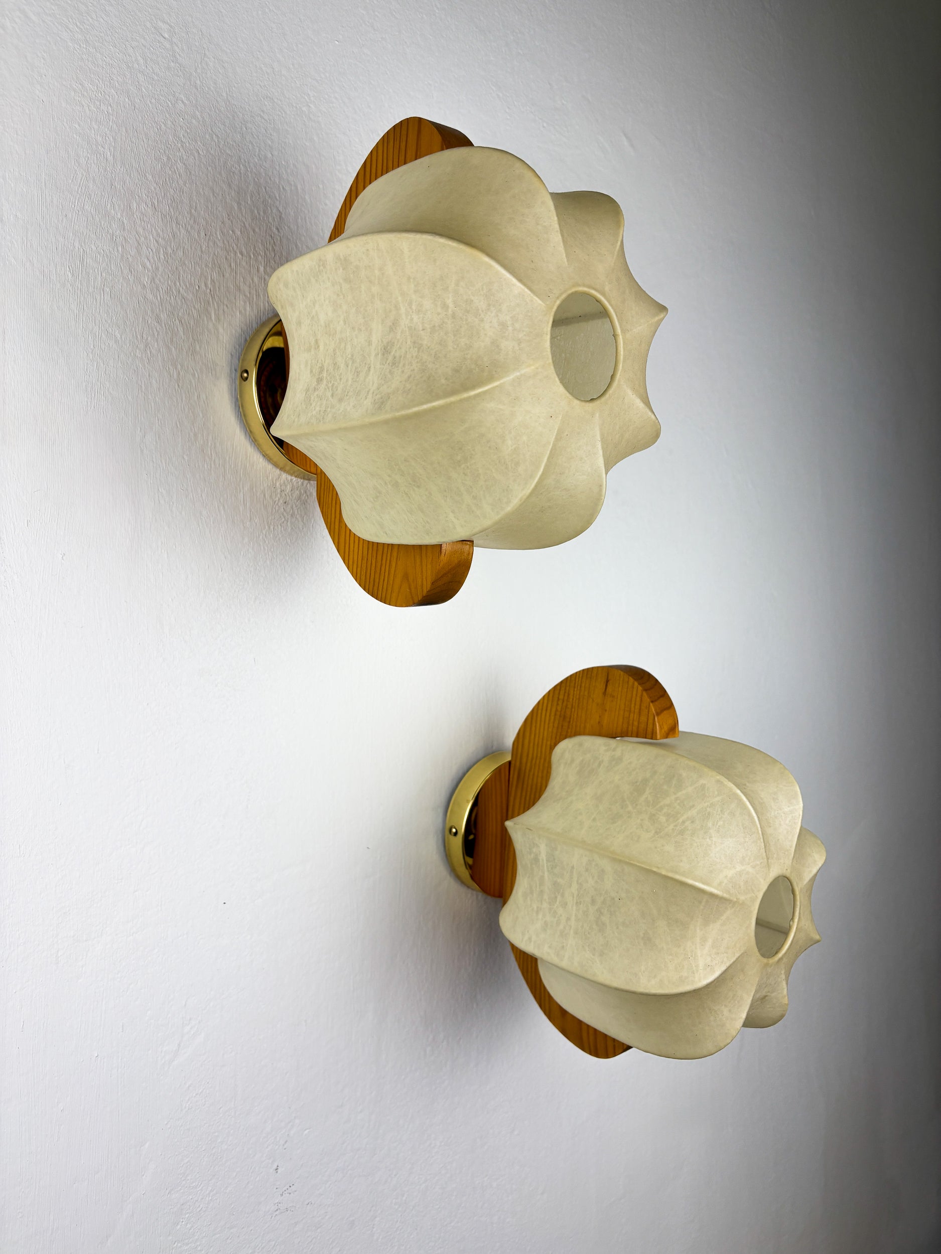 Pair of cocoon sconces with pine, Italy, 1970s
